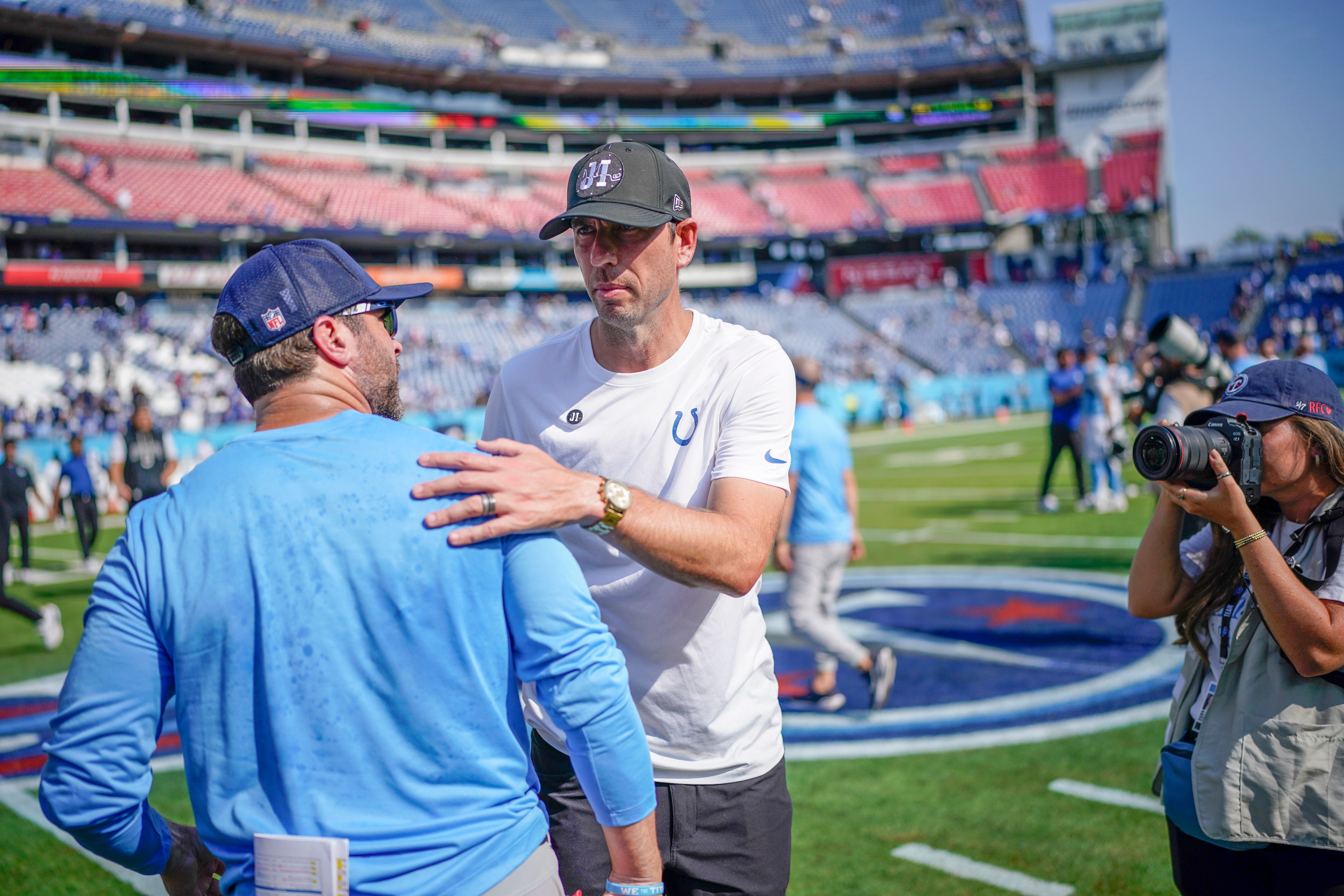 Colts head coach Shane Steichen meets Titans head coach Brian Callahan at mid field following their Week 3 matchup
