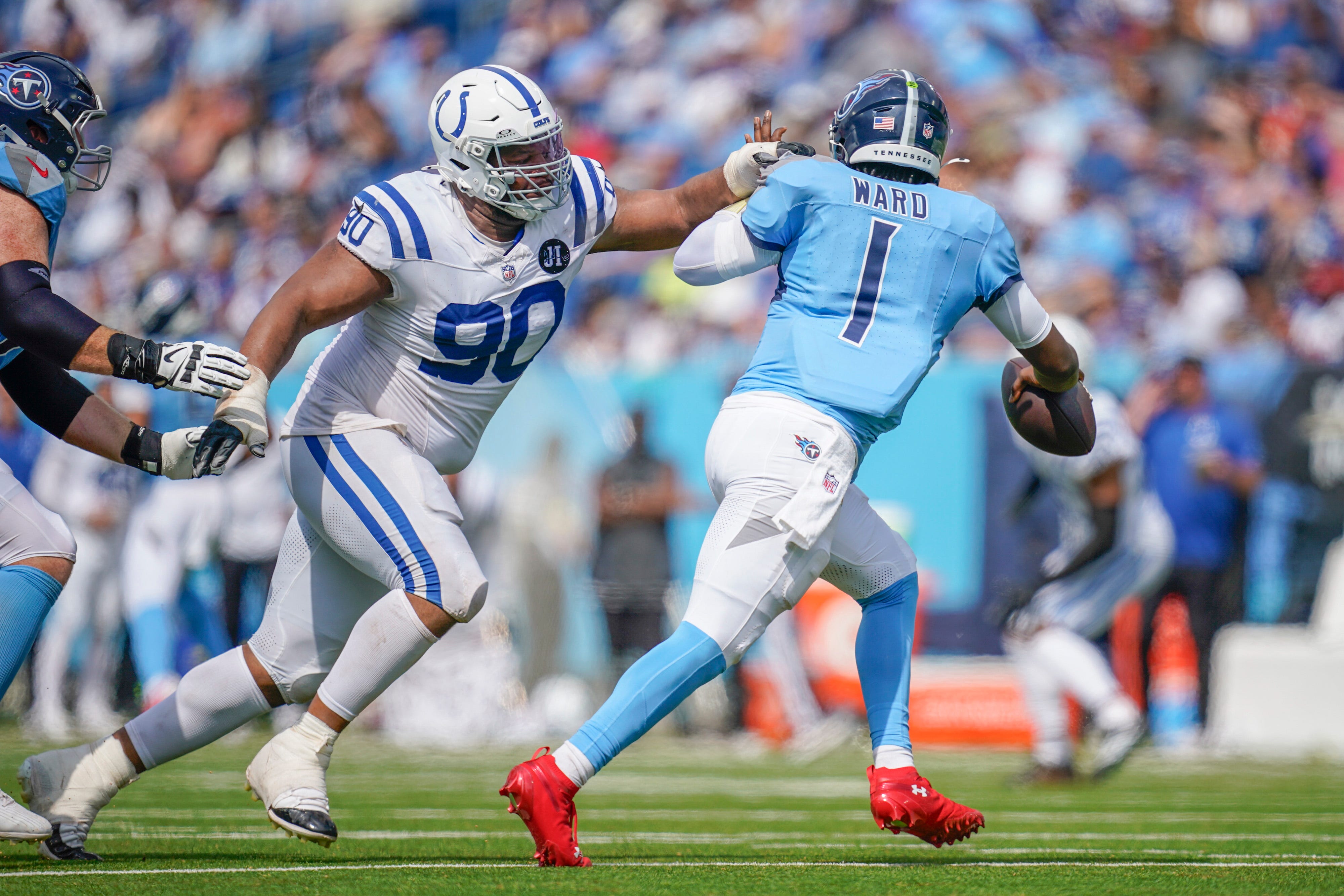 Colts DT pursues Titans QB Cam Ward