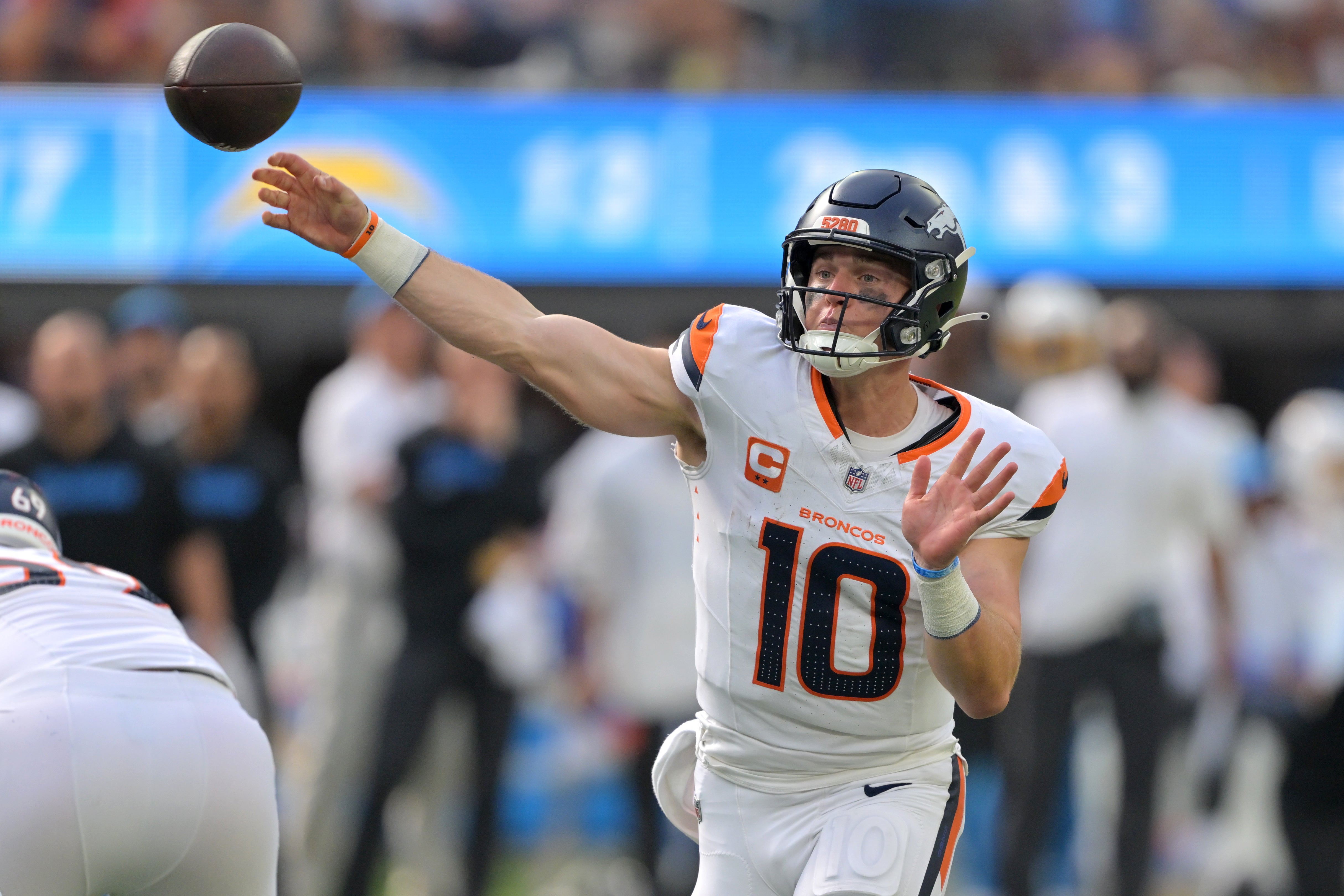 Sep 21, 2025; Inglewood, California, USA; Denver Broncos quarterback Bo Nix (10) throws a pass in the second half against the Los Angeles Chargers at SoFi Stadium.