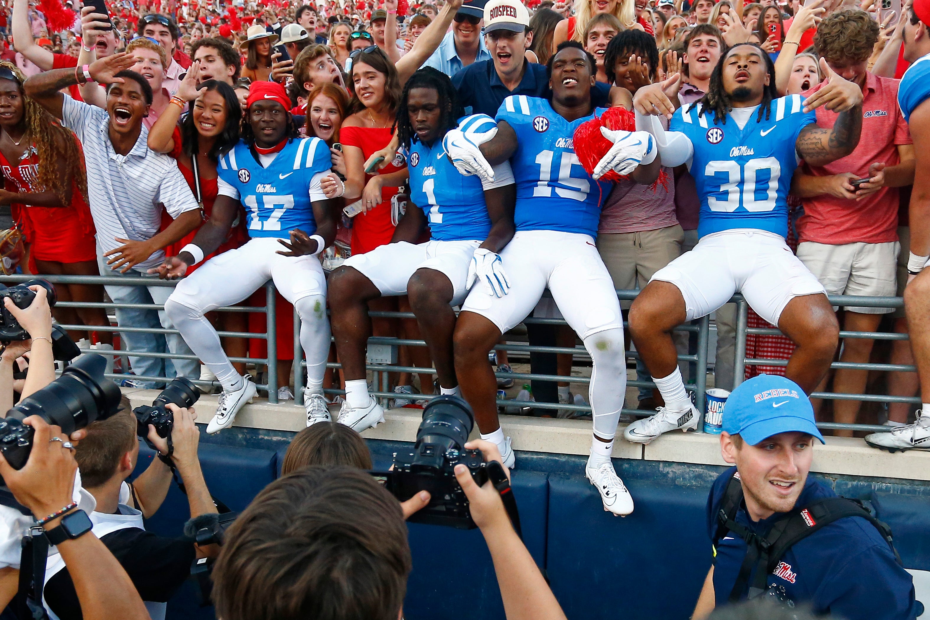 Sep 27, 2025; Oxford, Mississippi, USA; Mississippi Rebels players react with fans after defeating the LSU Tigers at Vaught-Hemingway Stadium.