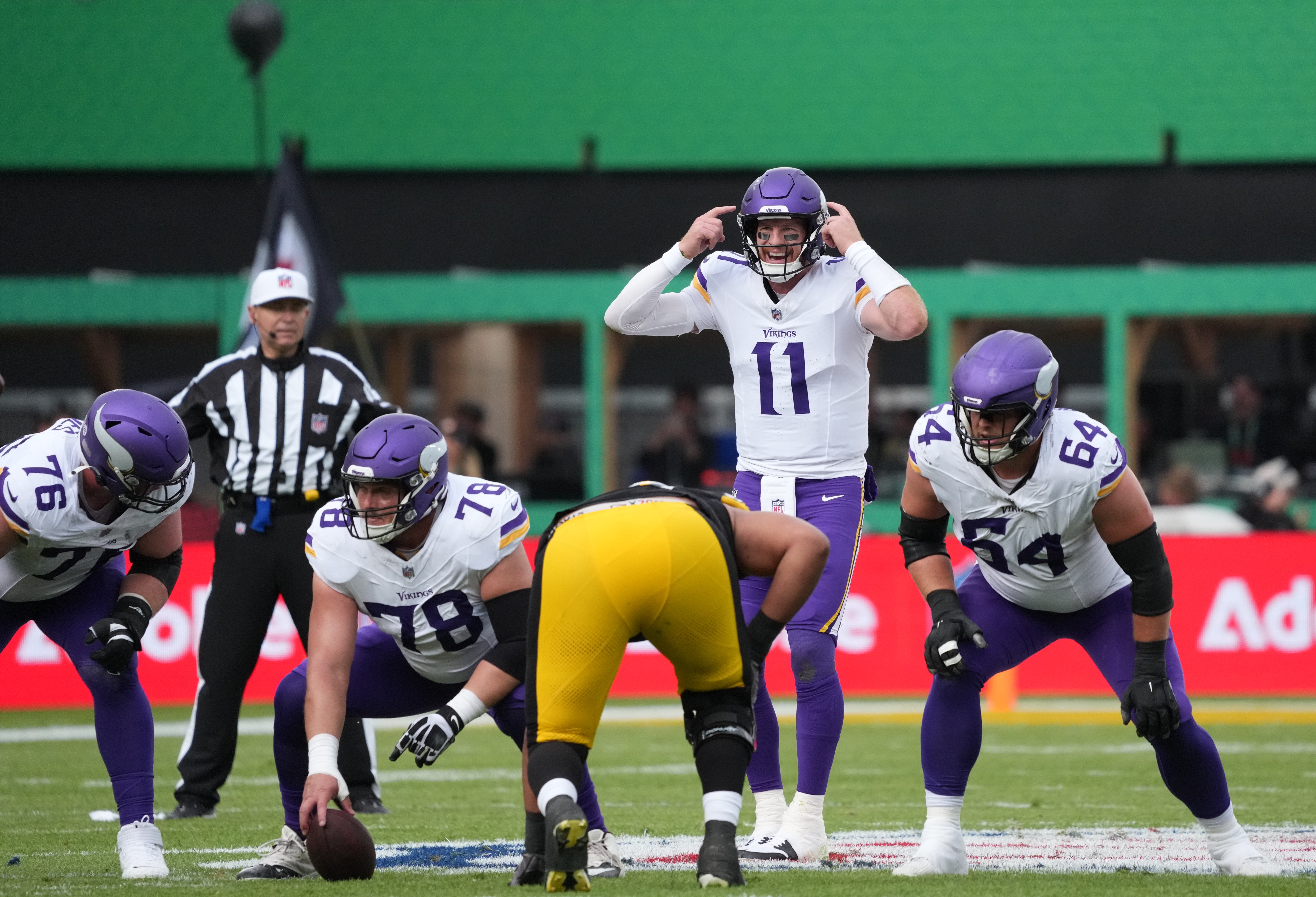 Sep 28, 2025; Dublin, Ireland; Minnesota Vikings quarterback Carson Wentz (11) directs a play during the second quarter against the Pittsburgh Steelers during an NFL International Series game at Croke Park.