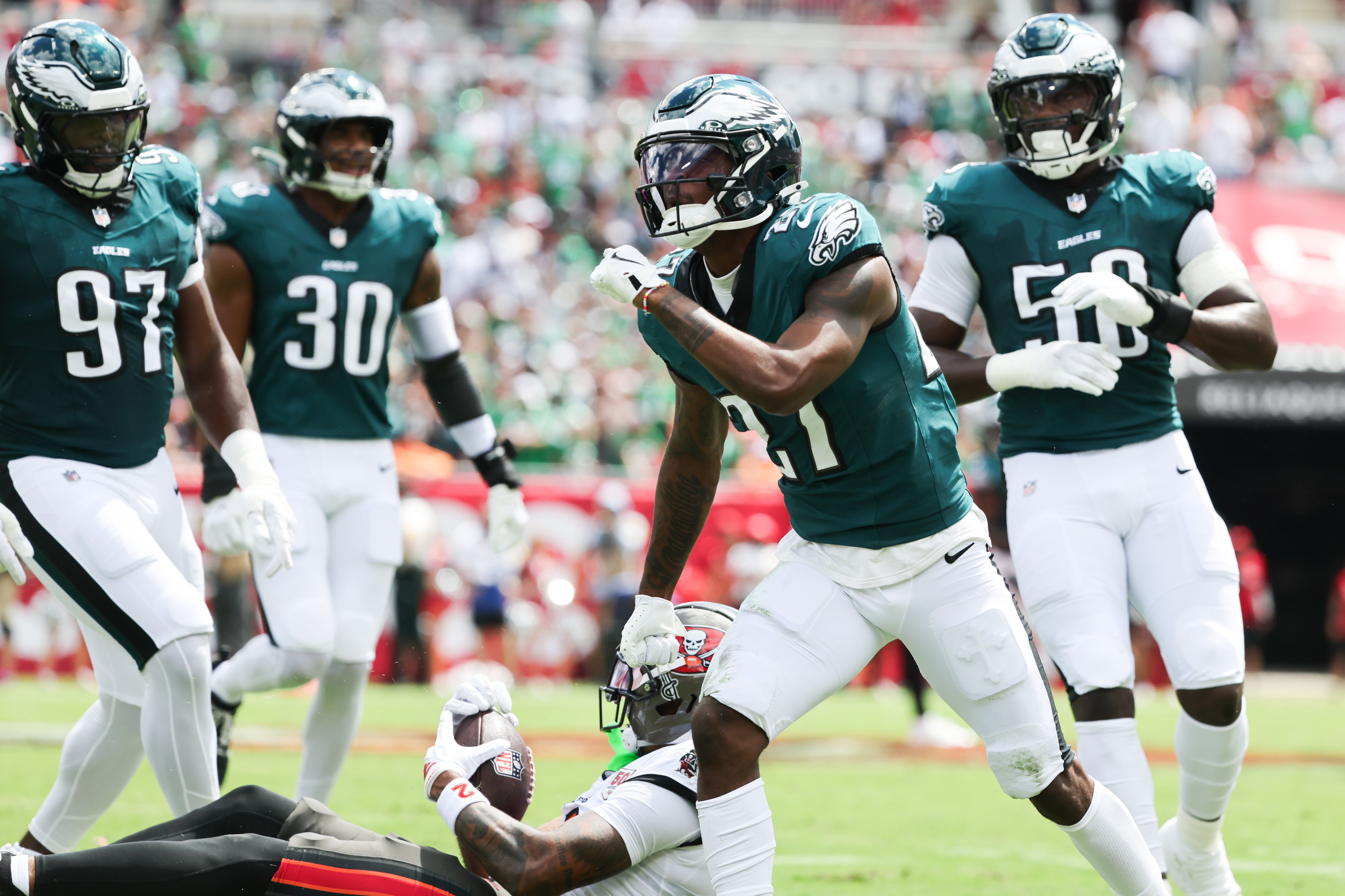 Philadelphia Eagles safety Sydney Brown (21) celebrates during the first quarter against the Tampa Bay Buccaneers at Raymond James Stadium.