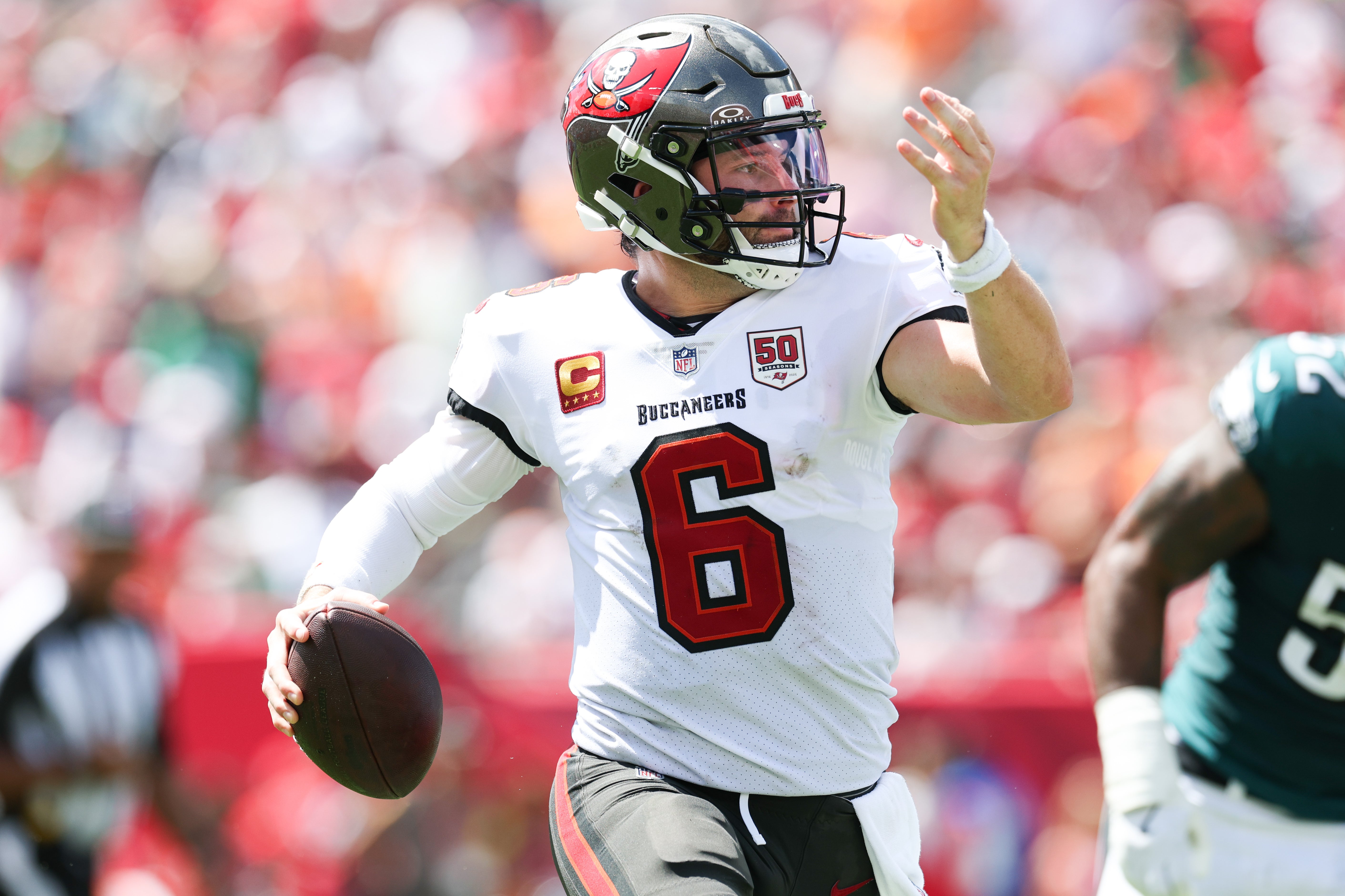 Sep 28, 2025; Tampa, Florida, USA; Tampa Bay Buccaneers quarterback Baker Mayfield (6) runs with the ball during the second quarter against the Philadelphia Eagles at Raymond James Stadium.