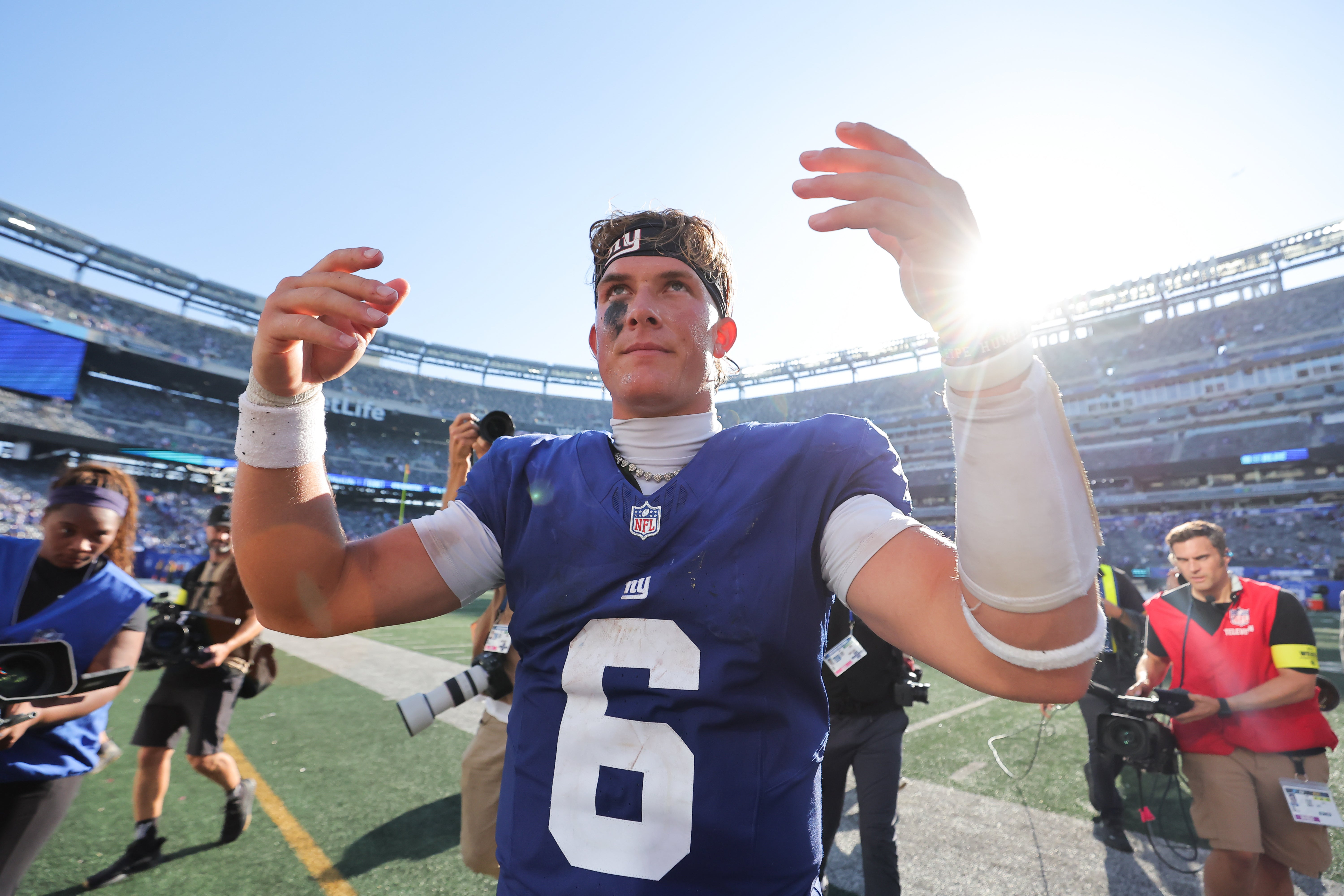 Sep 28, 2025; East Rutherford, New Jersey, USA; New York Giants quarterback Jaxson Dart (6) celebrates after the game against the Los Angeles Chargers at MetLife Stadium.