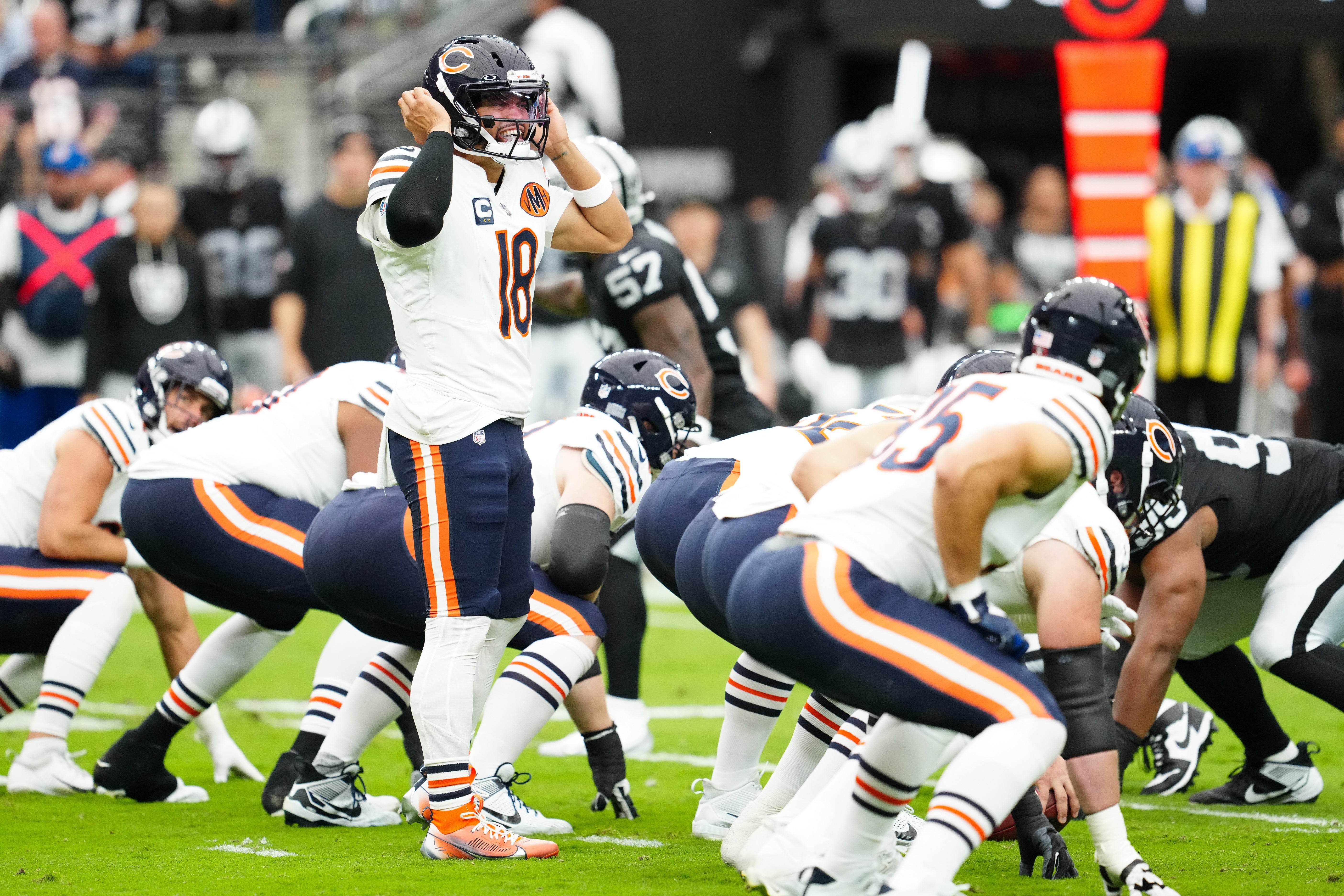 Sep 28, 2025; Paradise, Nevada, USA; Chicago Bears quarterback Caleb Williams (18) reacts during the first quarter against Las Vegas Raiders at Allegiant Stadium.
