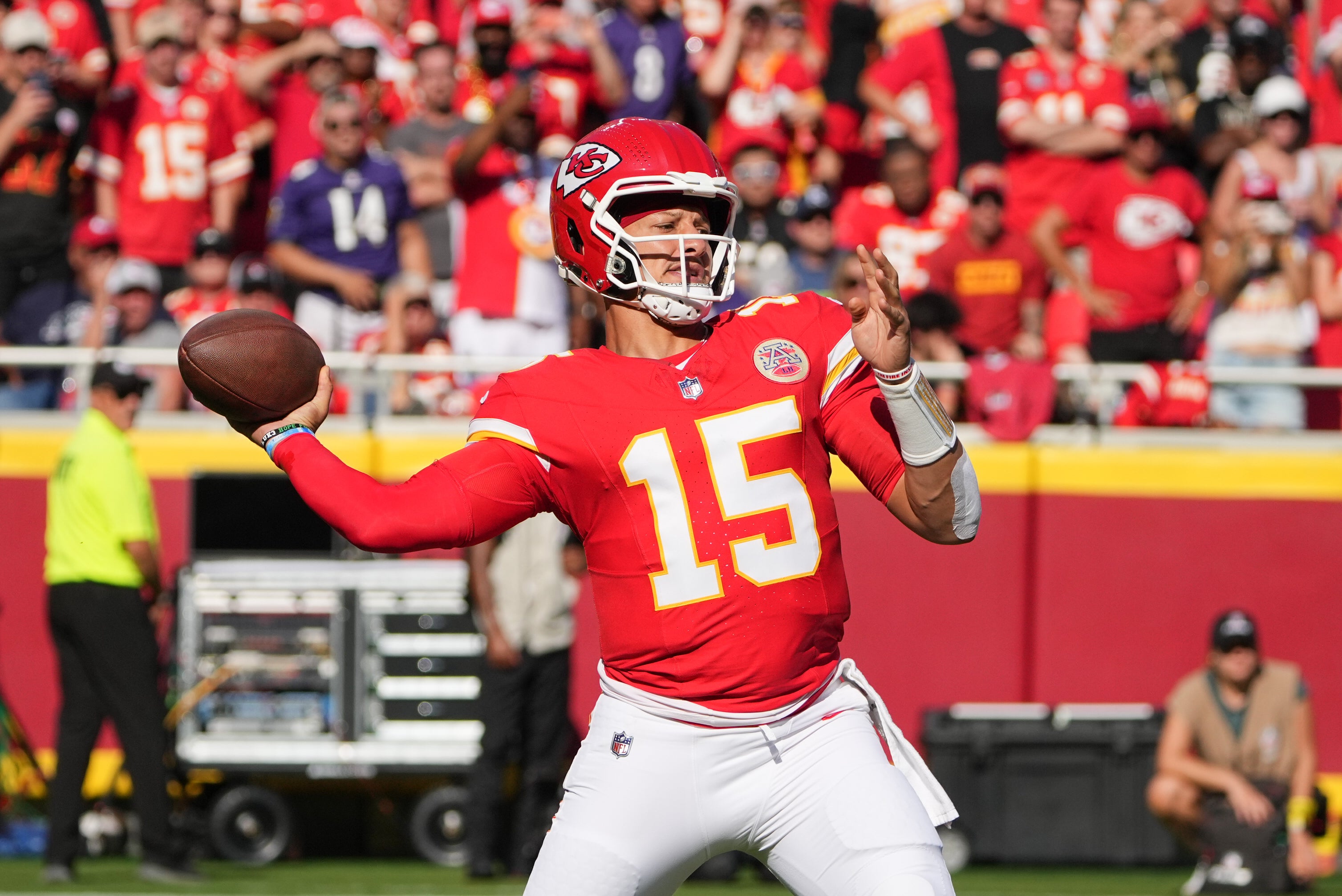 Kansas City Chiefs quarterback Patrick Mahomes (15) throws a pass during the first quarter against the Baltimore Ravens at GEHA Field at Arrowhead Stadium.