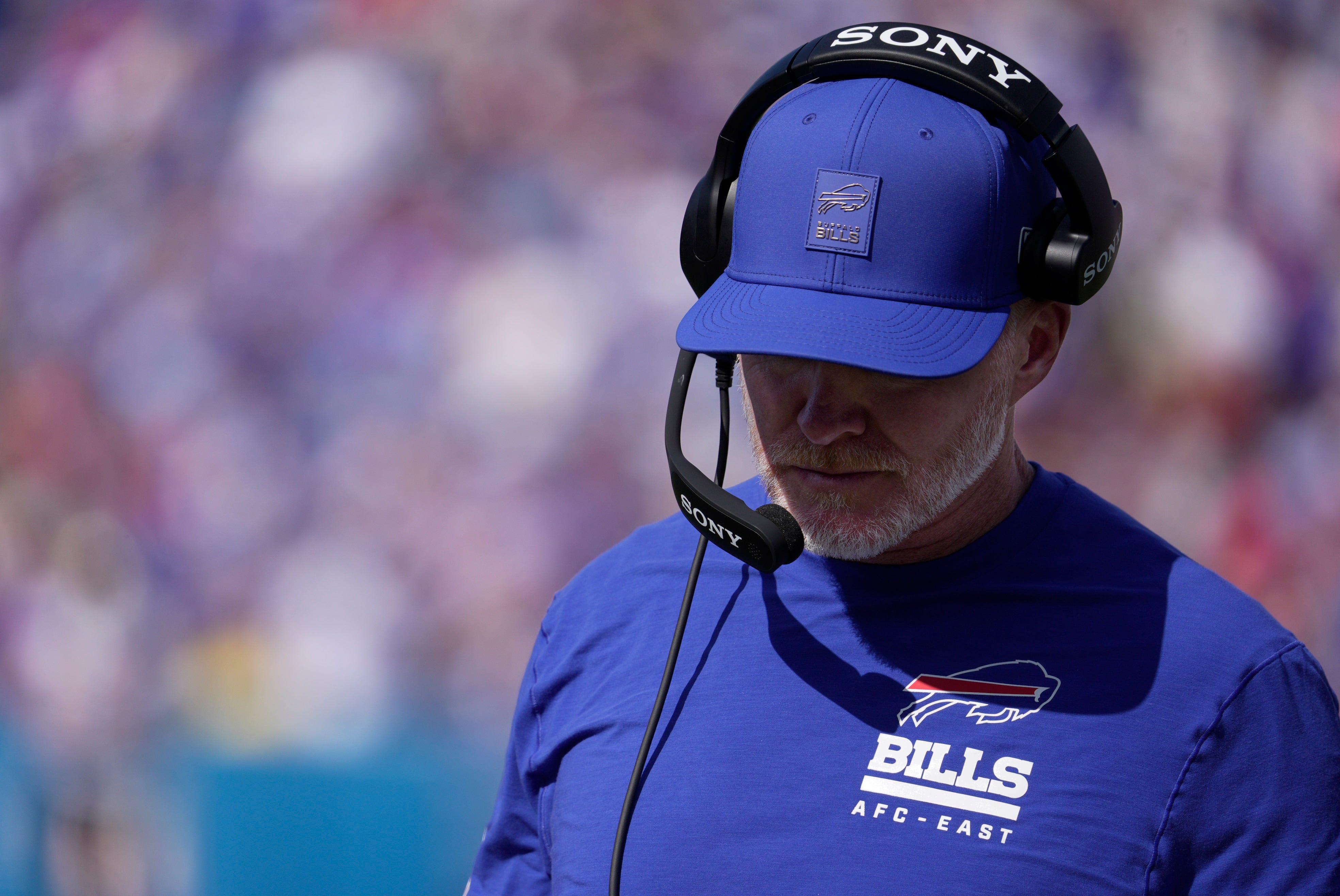 Buffalo Bills head coach Sean McDermott looks at his tablet after a play during first half action of the Bills home game against the New Orleans Saints in Orchard Park on Sept. 28, 2025.