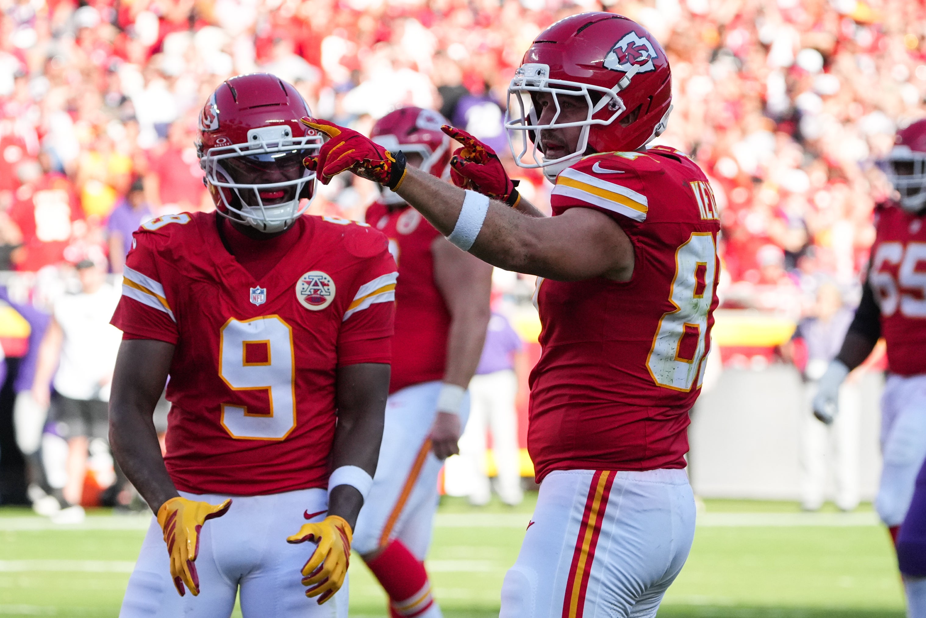 Kansas City Chiefs tight end Travis Kelce (87) celebrates after a run during the first half against the Baltimore Ravens