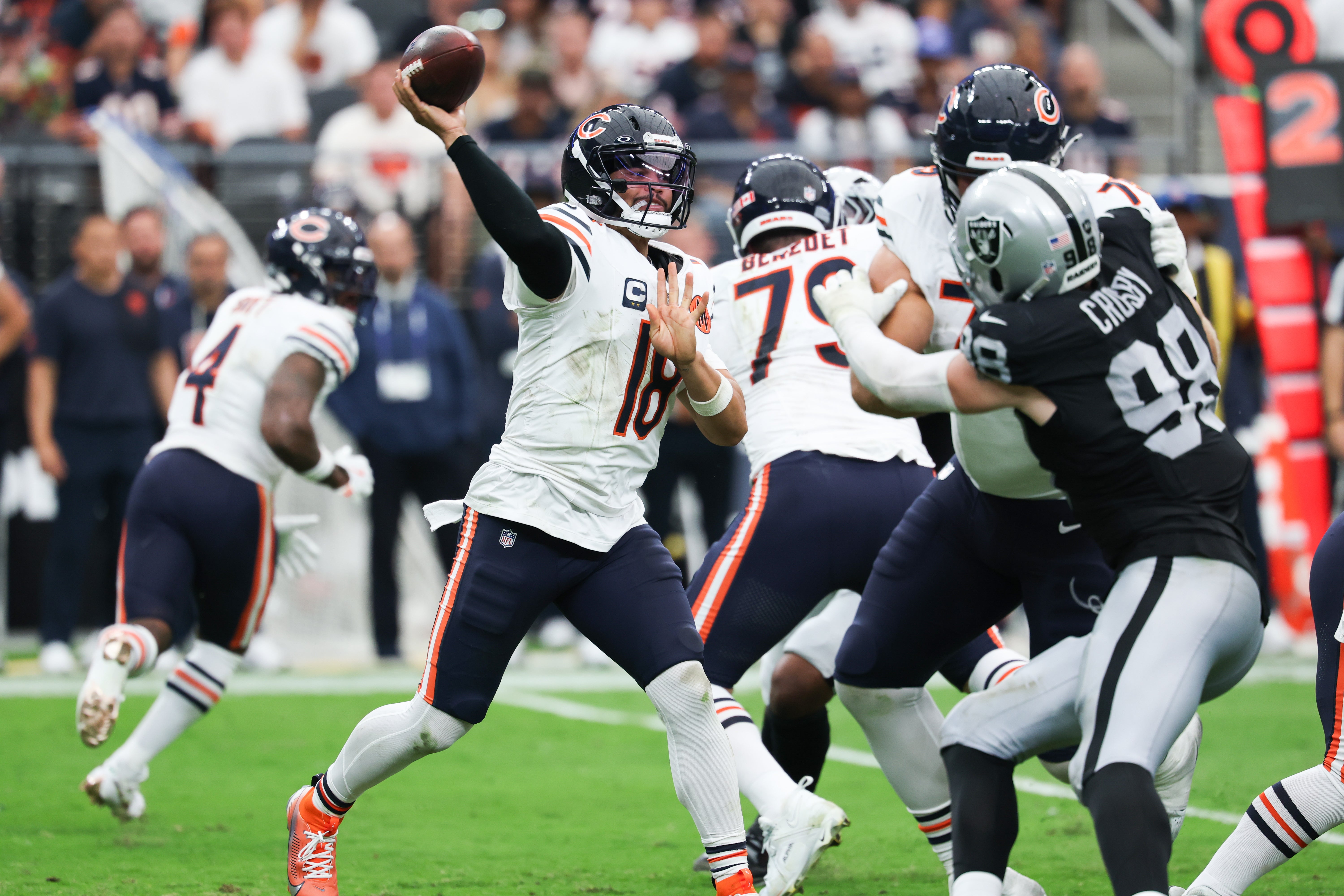 Sep 28, 2025; Paradise, Nevada, USA; Chicago Bears quarterback Caleb Williams (18) prepares to throw the ball during the second quarter against the Las Vegas Raiders at Allegiant Stadium.