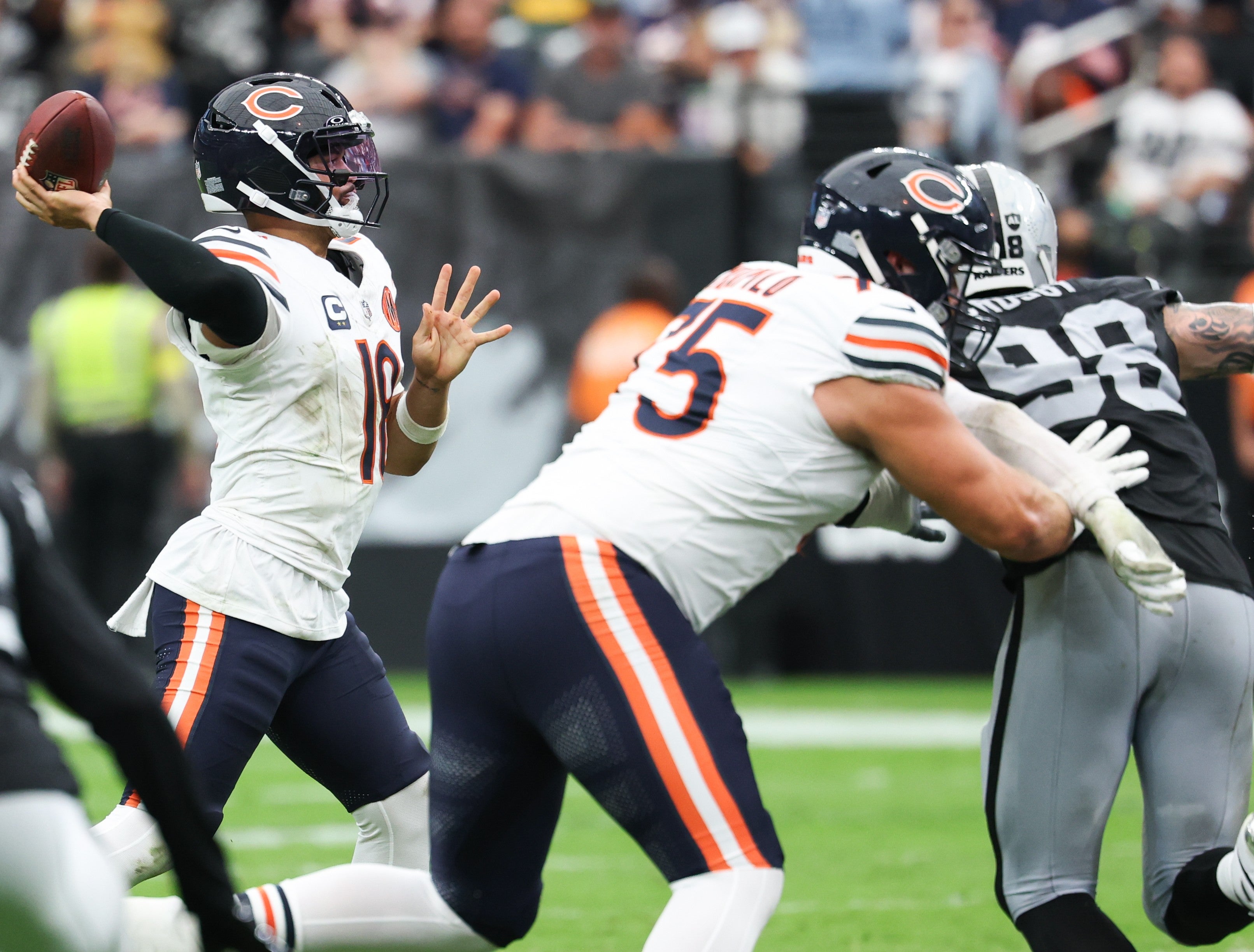 Sep 28, 2025; Paradise, Nevada, USA; Chicago Bears quarterback Caleb Williams (18) throws the ball during the second quarter against Las Vegas Raiders at Allegiant Stadium.