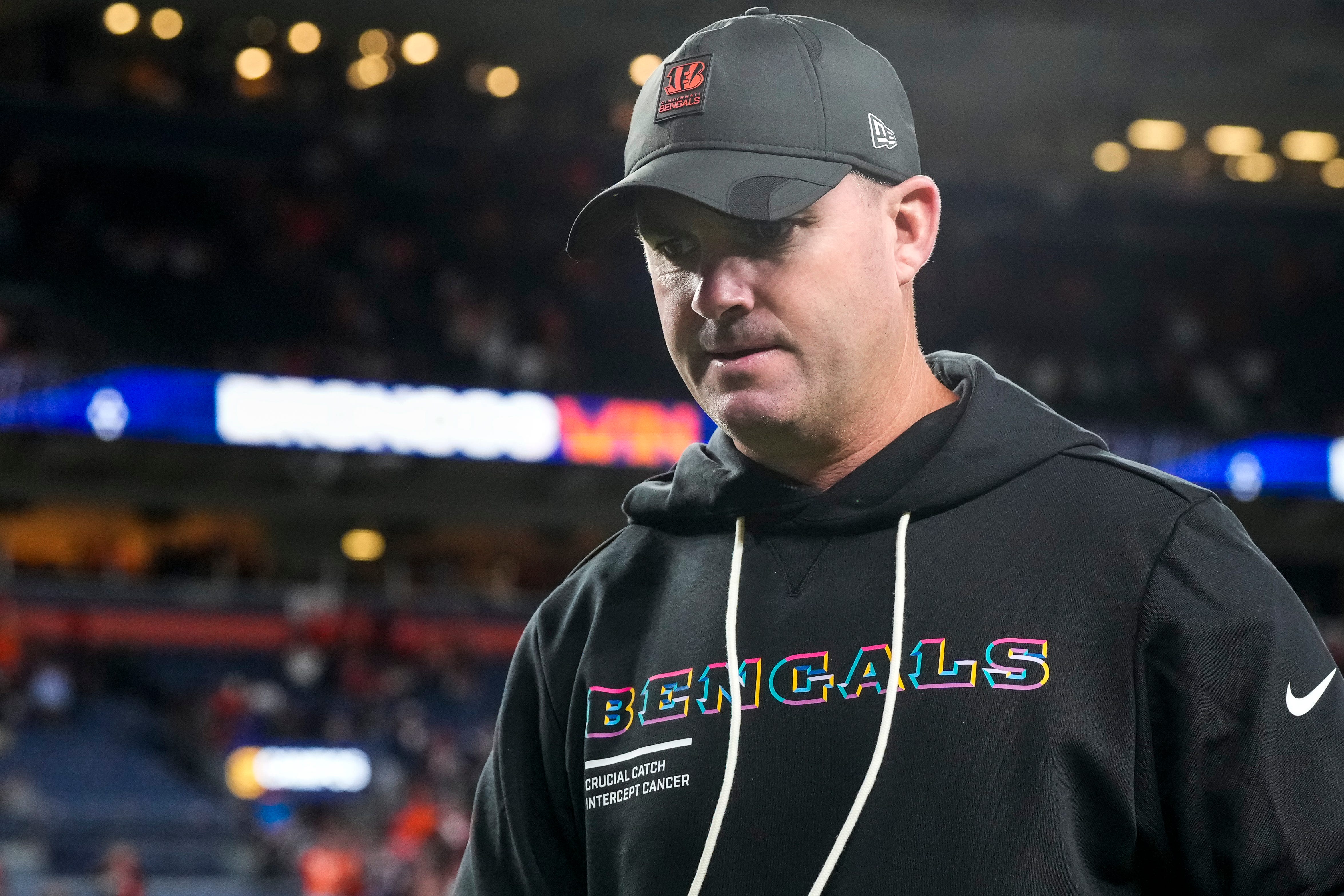 Cincinnati Bengals head coach Zac Taylor walks off the field after the fourth quarter of the NFL Week 4 Monday Night Football game between the Denver Broncos and the Cincinnati Bengals at Empower Field at Mile High in Denver on Monday, Sept. 29, 2025. The Bengals fell to 2-2 with a 28-3 loss to the Broncos.