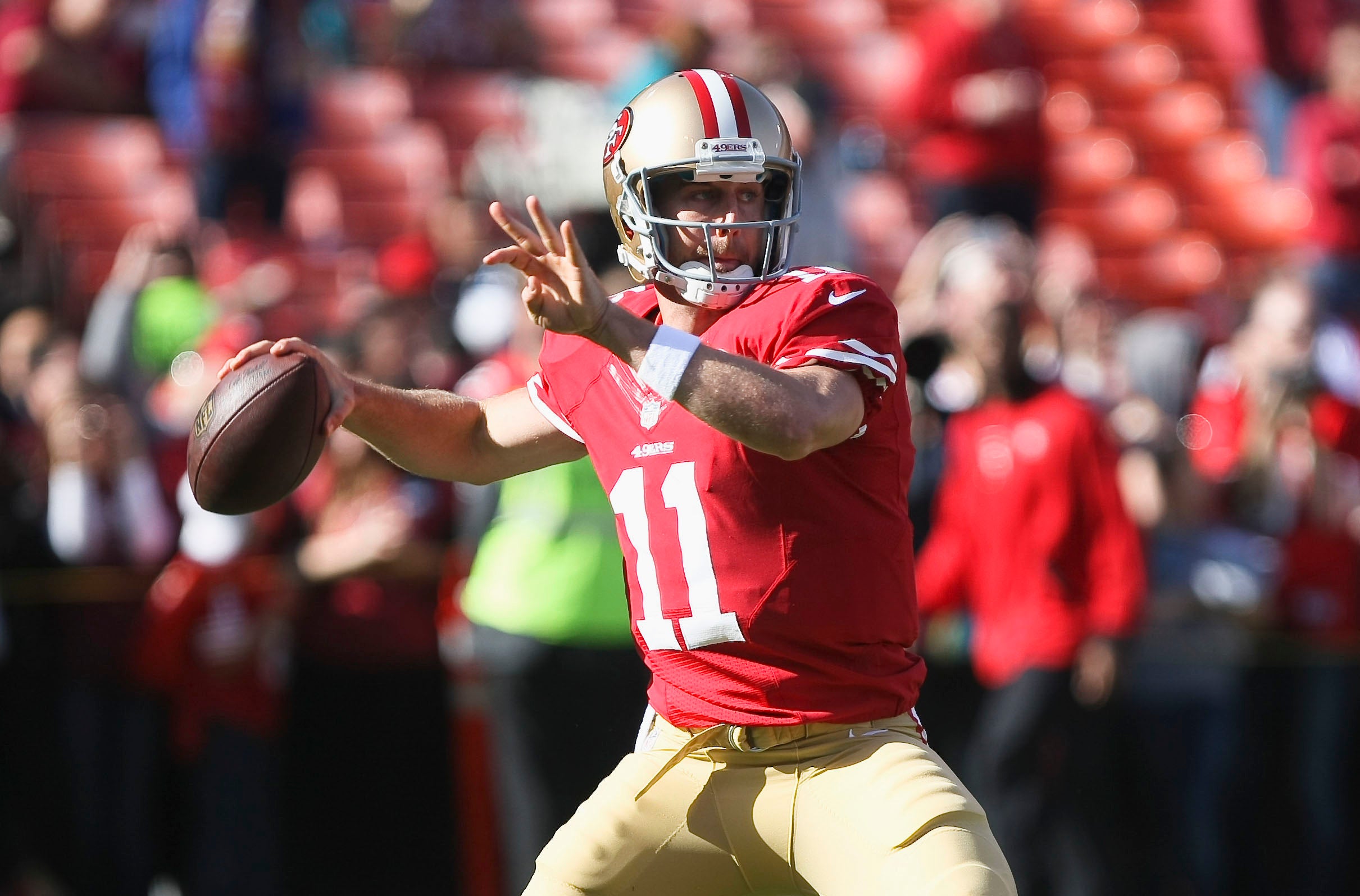 San Francisco 49ers quarterback Alex Smith (11) throws the ball before the game against the Miami Dolphins at Candlestick Park.
