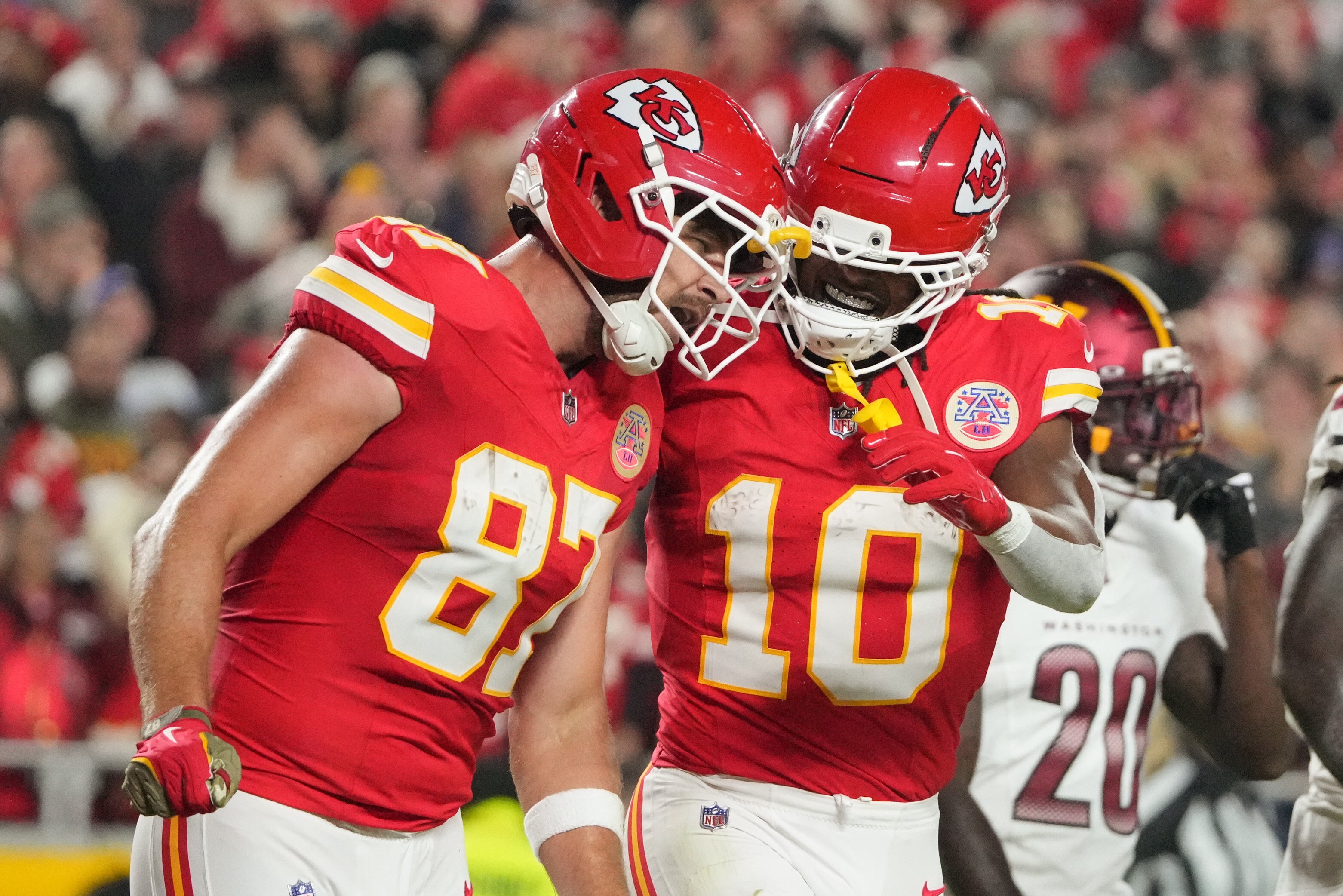 Kansas City Chiefs tight end Travis Kelce running back Isiah Pacheco