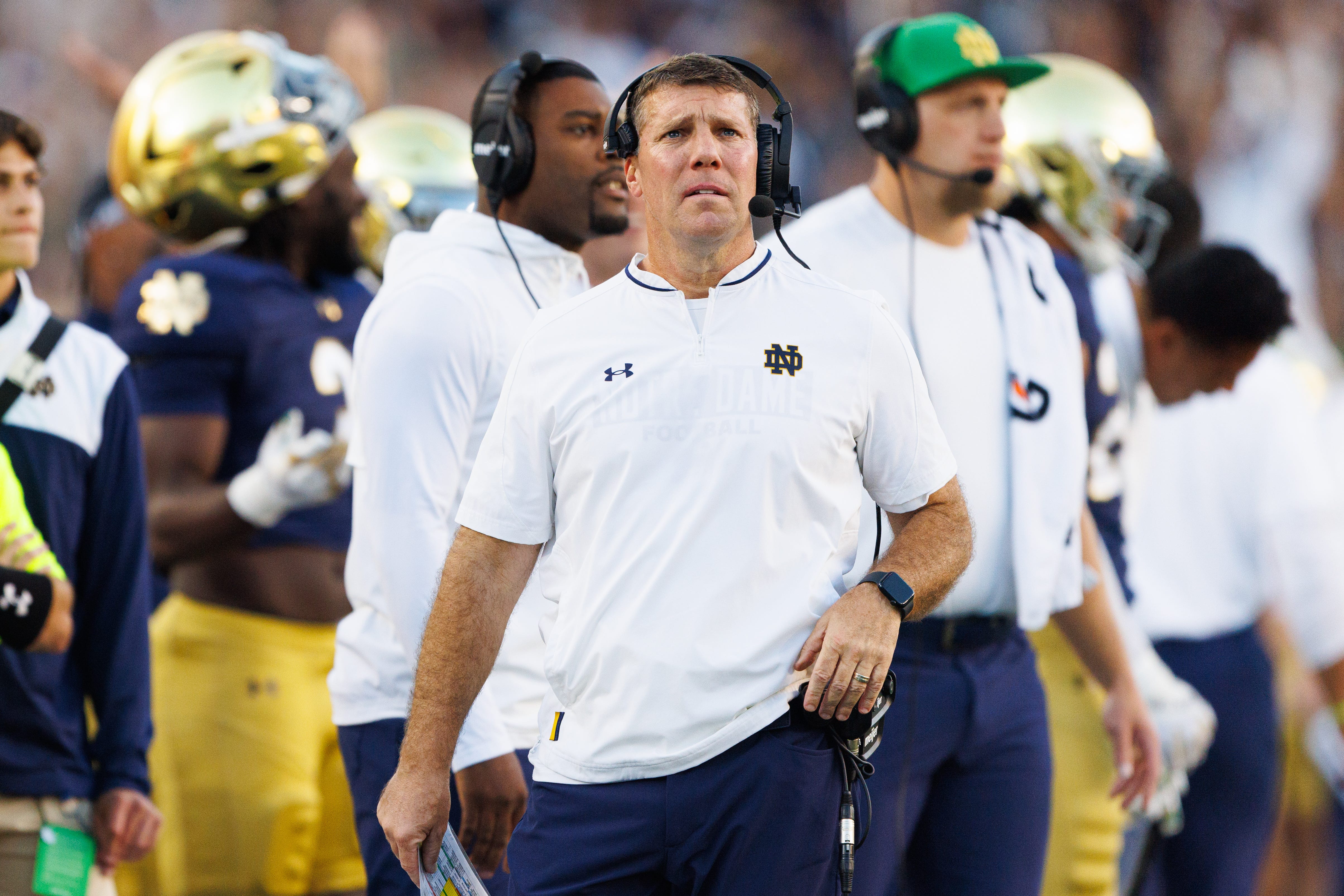 Notre Dame defensive coordinator Chris Ash looks on in the second half of a NCAA football game against NC State at Notre Dame Stadium on Saturday, Oct. 11, 2025, in South Bend.