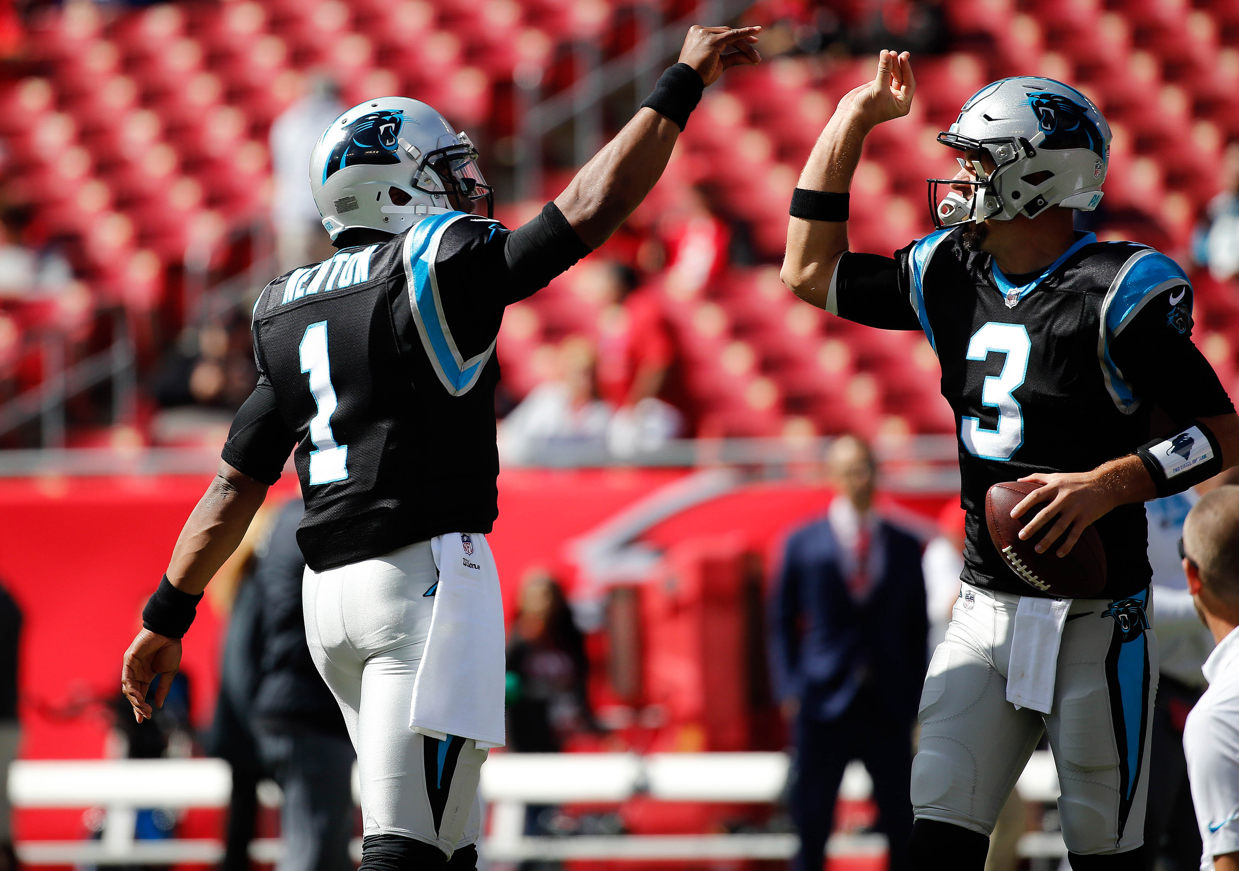 Oct 29, 2017; Tampa, FL, USA; Carolina Panthers quarterback Cam Newton (1) and Carolina Panthers quarterback Derek Anderson (3) work out prior to the game at Raymond James Stadium.