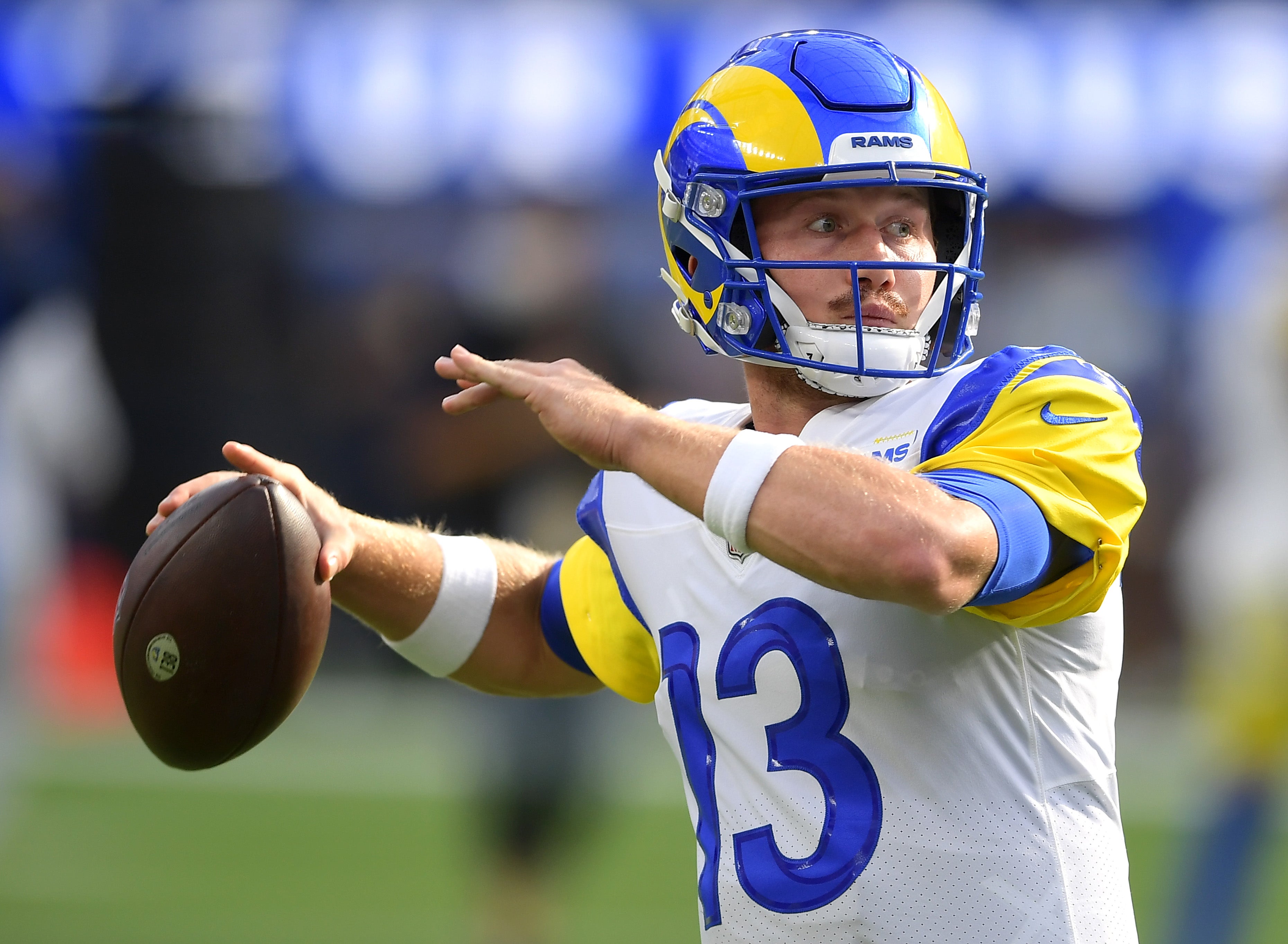 Sep 12, 2021; Inglewood, California, USA; Los Angeles Rams quarterback John Wolford (13) warms up before the game against the Chicago Bears at SoFi Stadium.