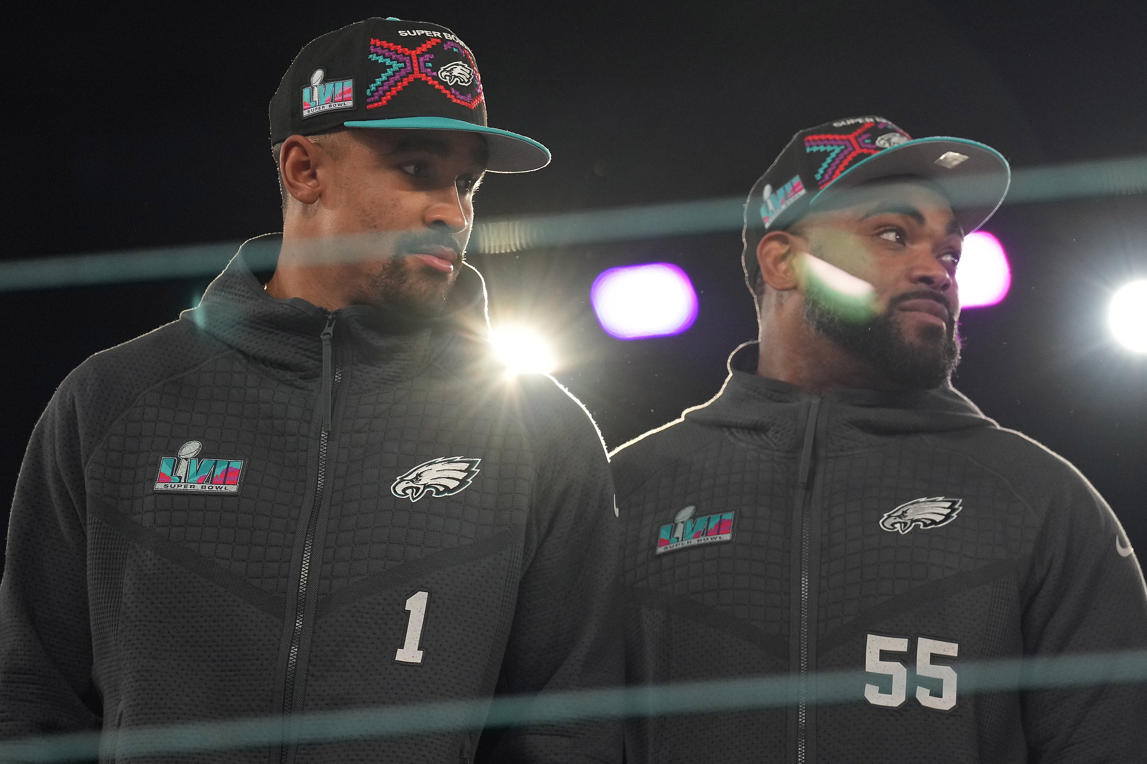 Philadelphia Eagles quarterback Jalen Hurts (1) and defensive end Brandon Graham (55) during Super Bowl Opening Night at Footprint Center.