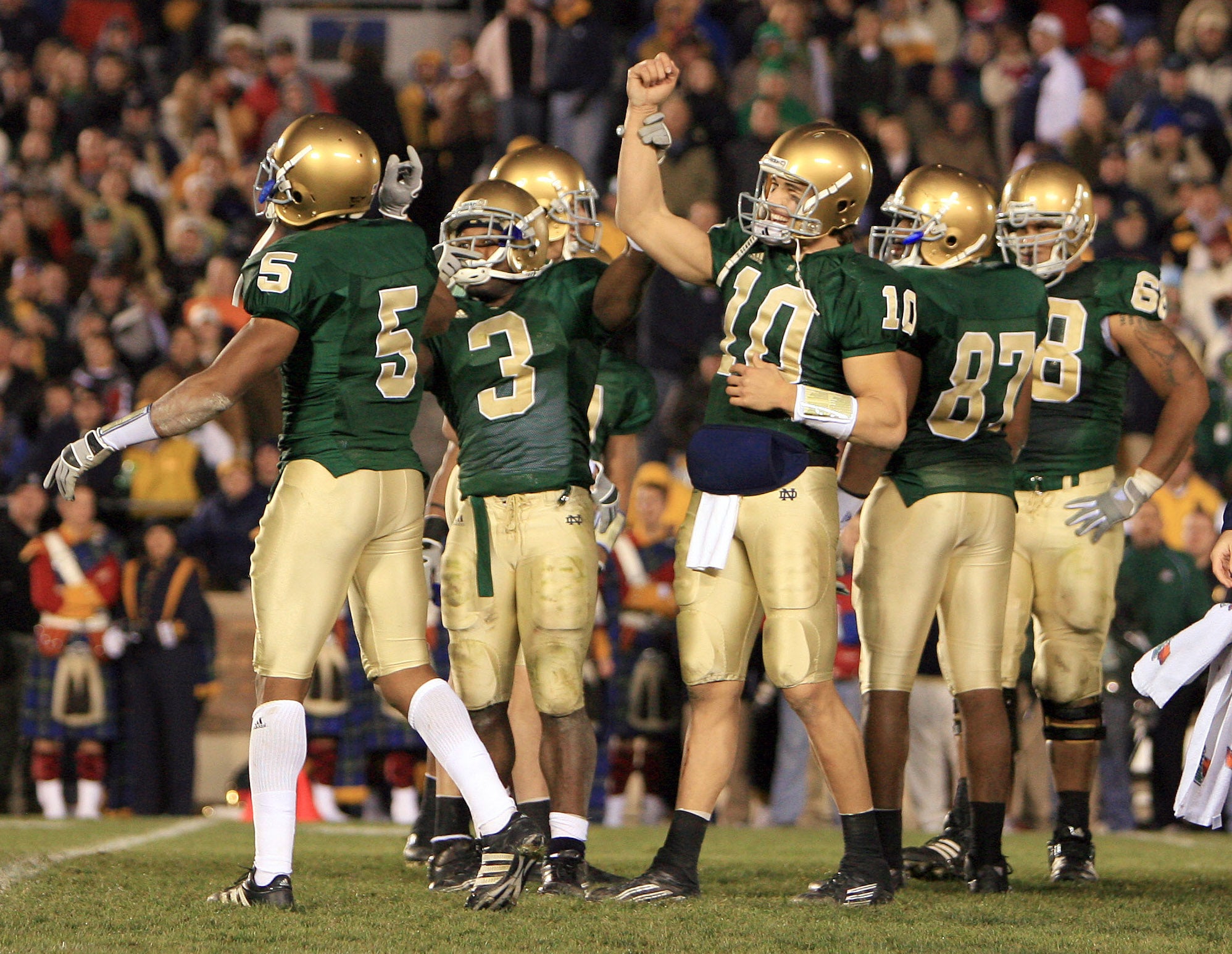Nov. 18, 2006; South Bend, IN, USA; Notre Dame Fighting Irish running back (3) Darius Walker raises the arm of quarterback (10) Brady Quinn to acknowledge the crowd in the fourth quarter of their 41-9 win over the Army Black Knights. Mandatory Credit: Matt Cashore-USA TODAY Sports © copyright (2006) Matt Cashore