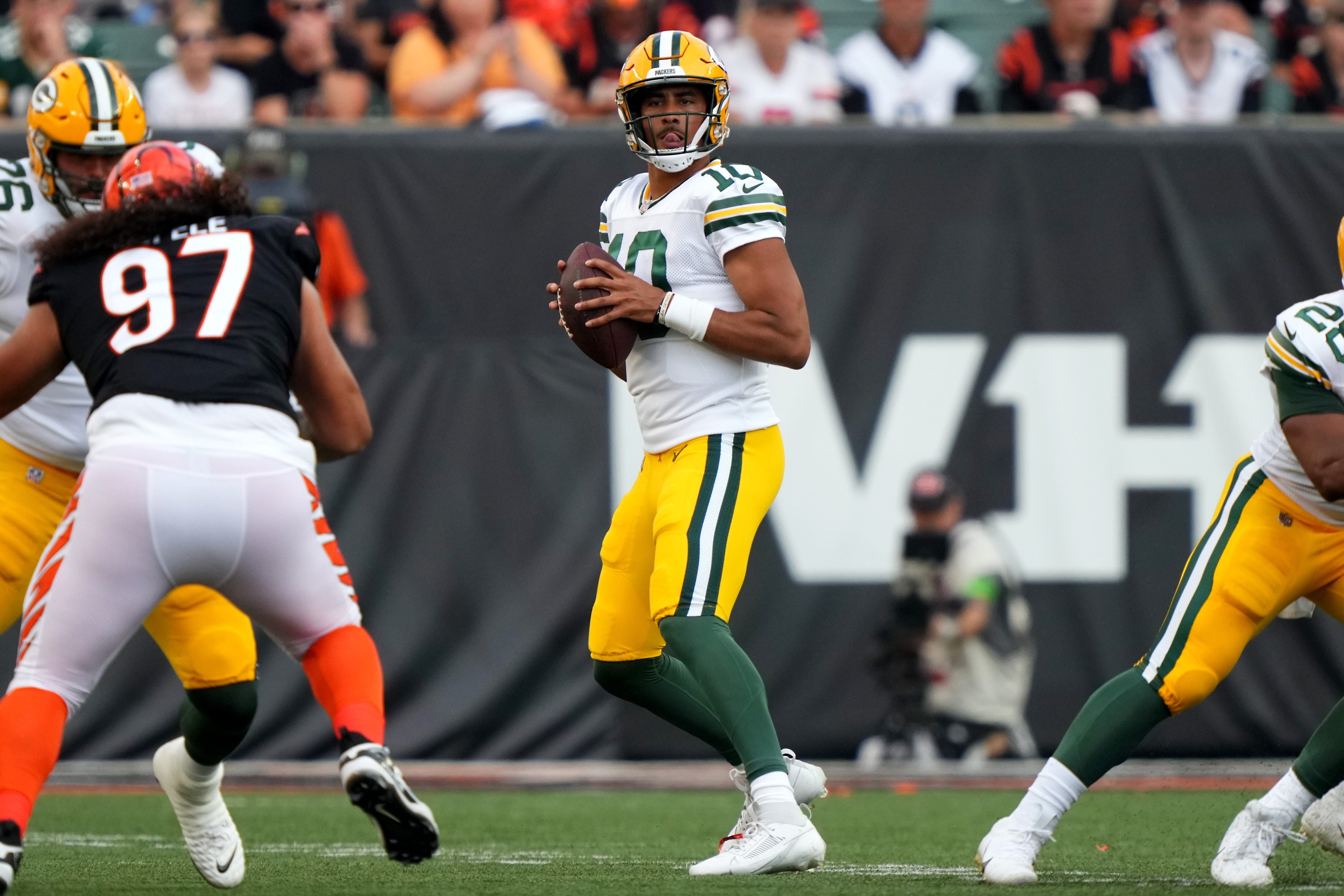 Green Bay Packers quarterback Jordan Love (10) looks to pass in the first quarter during a Week 1 NFL preseason game between the Green Bay Packers and the Cincinnati Bengals,Friday, Aug. 11, 2023, at Paycor Stadium in Cincinnati.