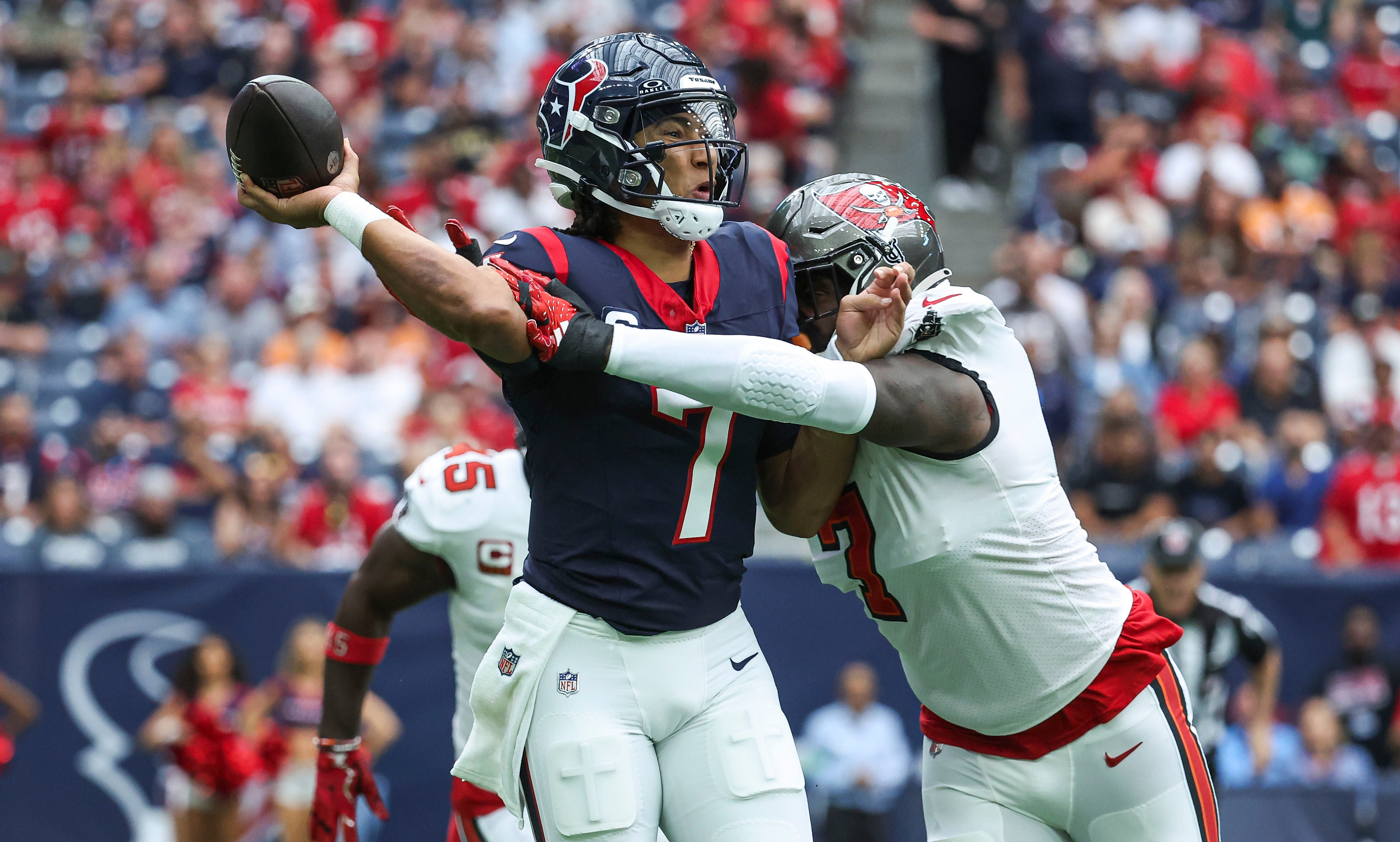 Former Buccaneers Shaq Barrett attempts to sack Texans QB CJ Stroud
