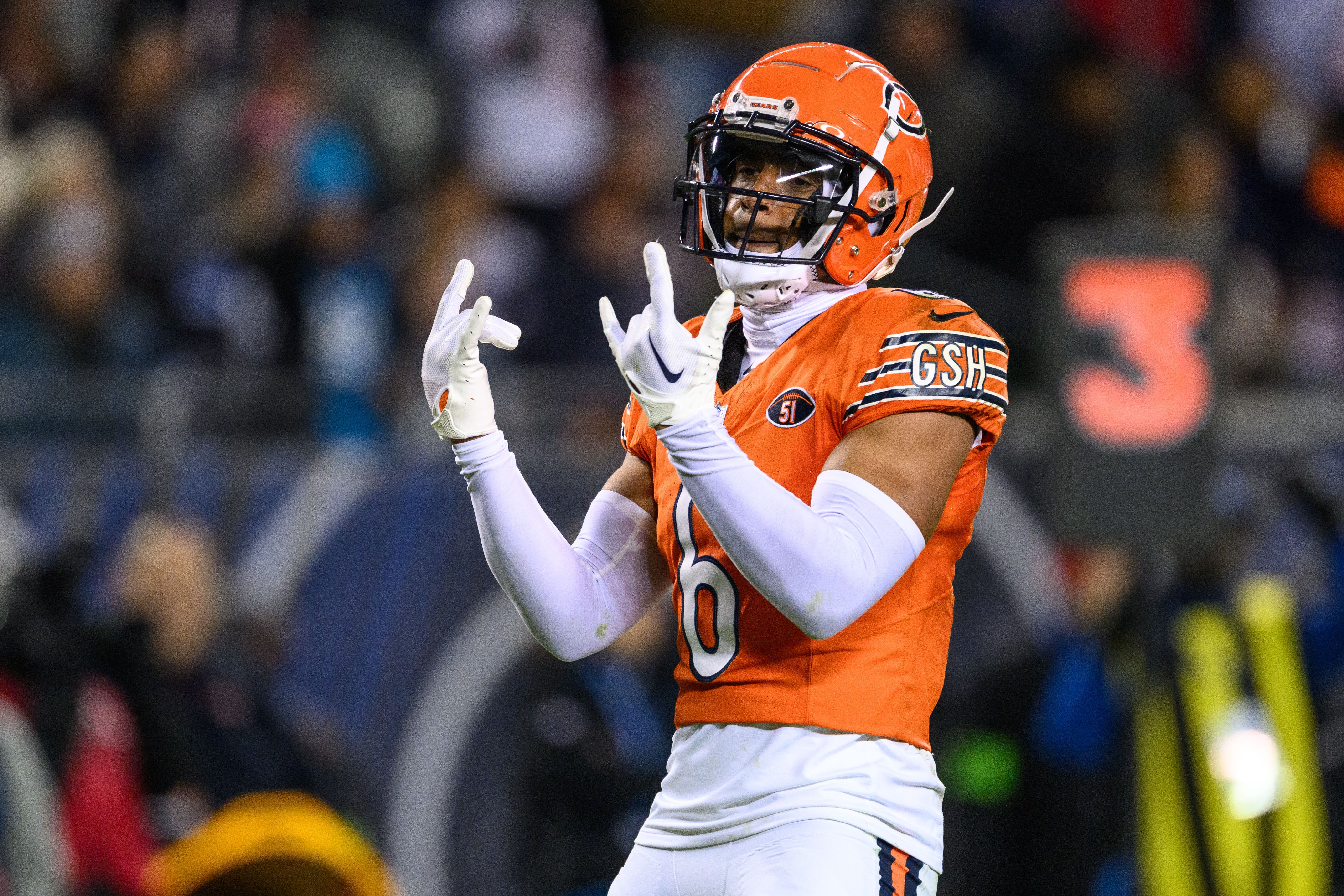 Nov 9, 2023; Chicago, Illinois, USA; Chicago Bears defensive back Kyler Gordon (6) celebrates a defensive play against the Carolina Panthers during the fourth quarter at Soldier Field.