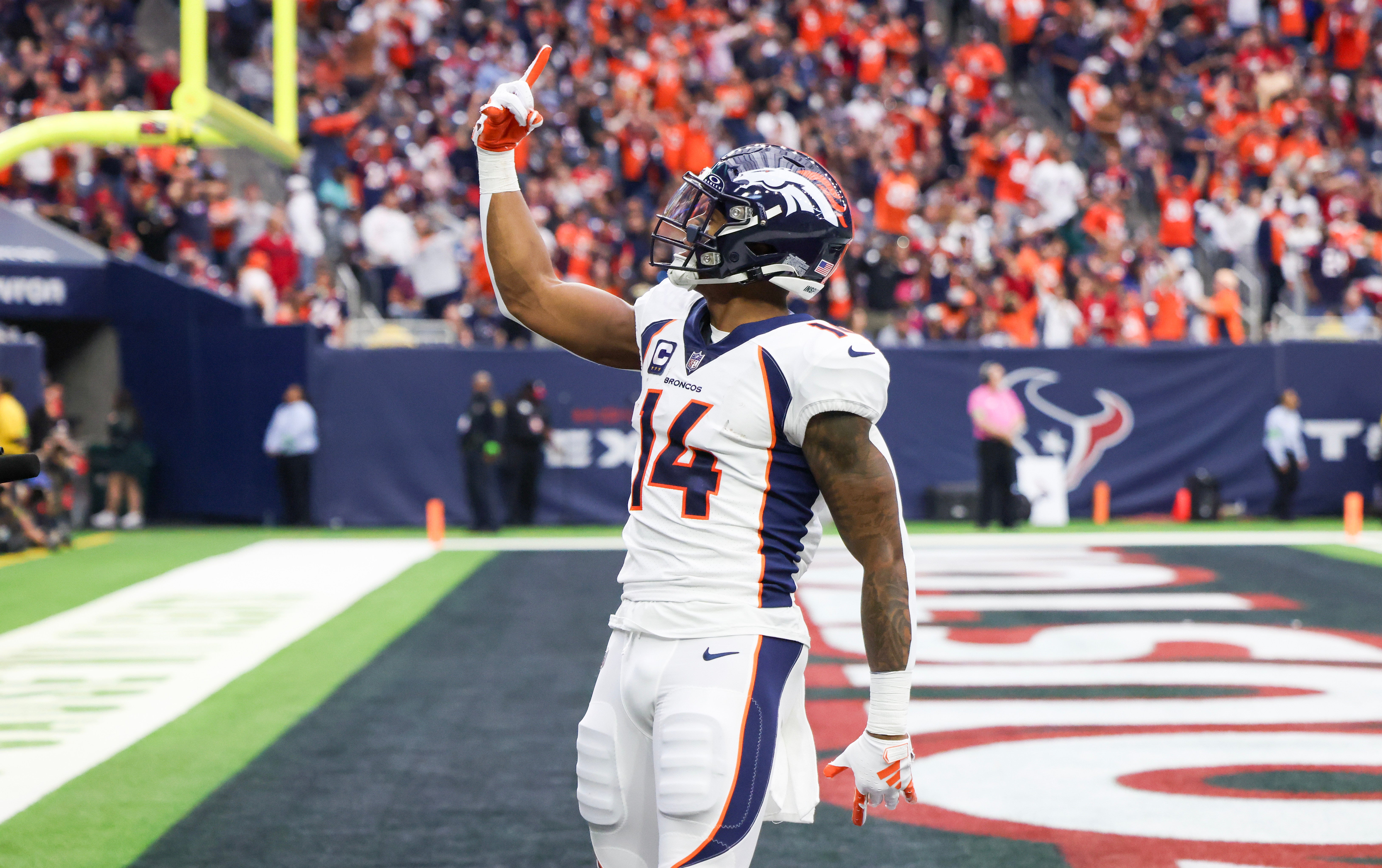 Dec 3, 2023; Houston, Texas, USA; Denver Broncos wide receiver Courtland Sutton (14) celebrates his touchdown reception against the Houston Texans in the second half at NRG Stadium.