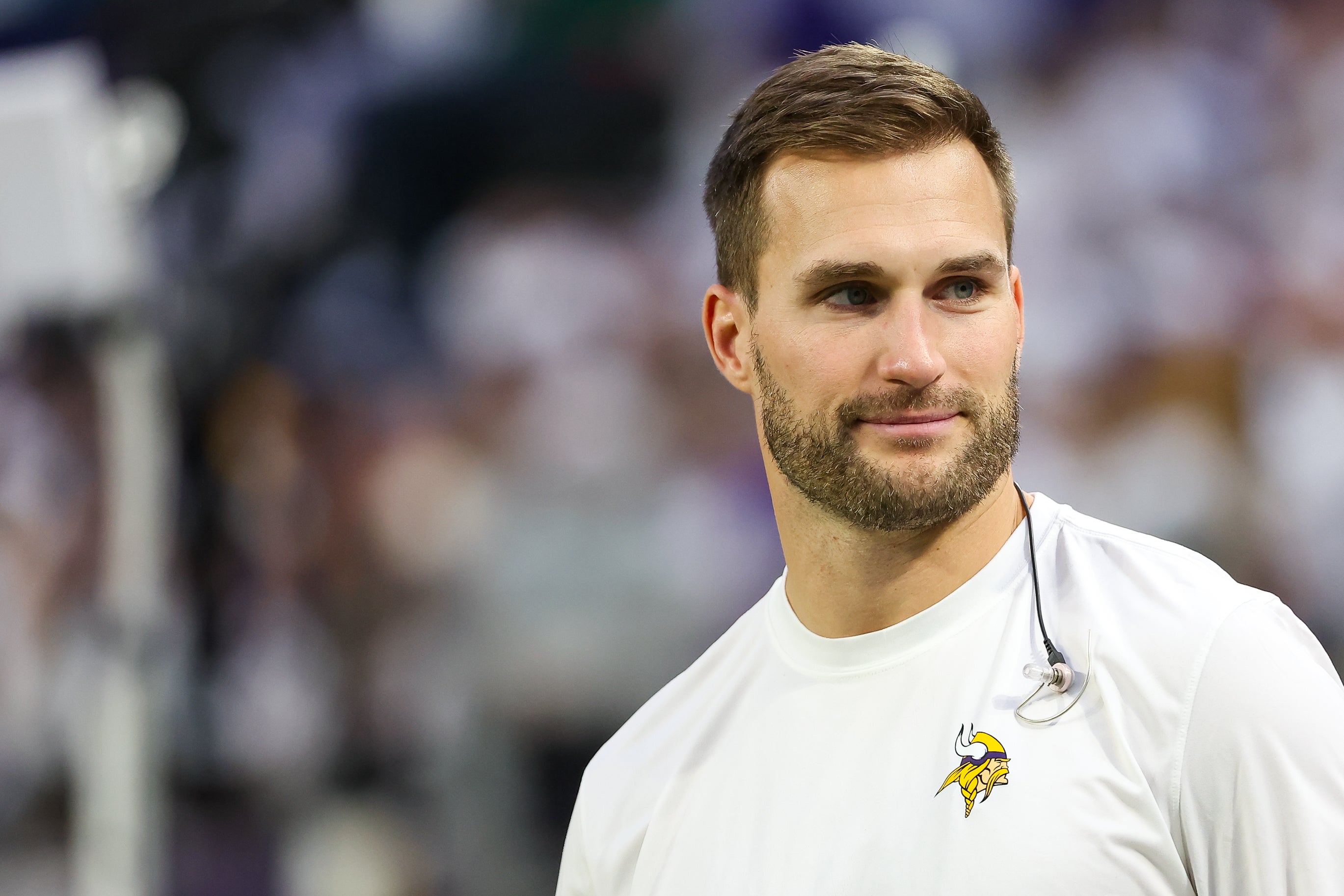 Dec 24, 2023; Minneapolis, Minnesota, USA; Minnesota Vikings quarterback Kirk Cousins (8) looks on from the bench during the second quarter against the Detroit Lions at U.S. Bank Stadium.