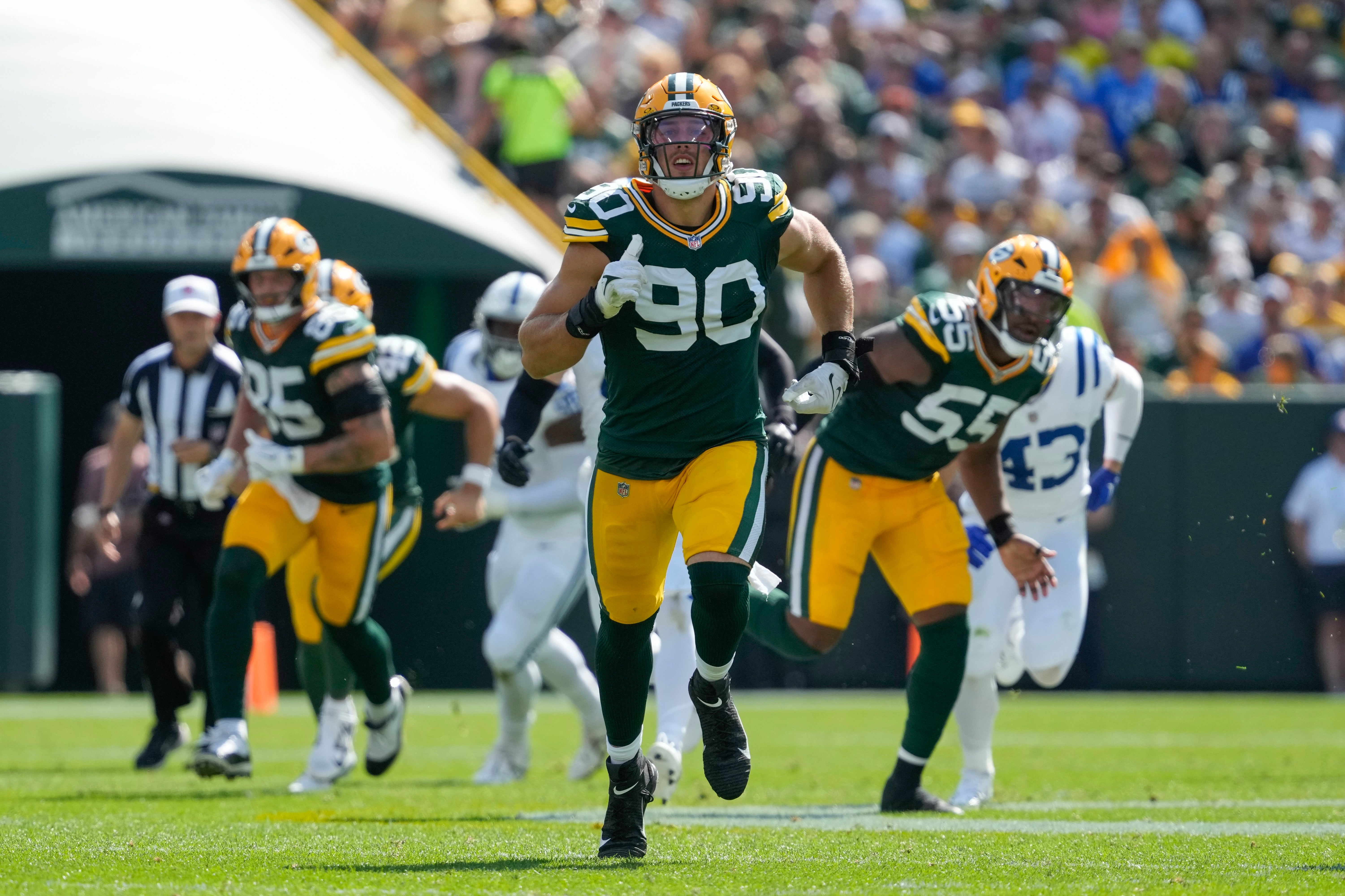 Sep 15, 2024; Green Bay, Wisconsin, USA; Green Bay Packers defensive lineman Lukas Van Ness (90) during the game against the Indianapolis Colts at Lambeau Field.