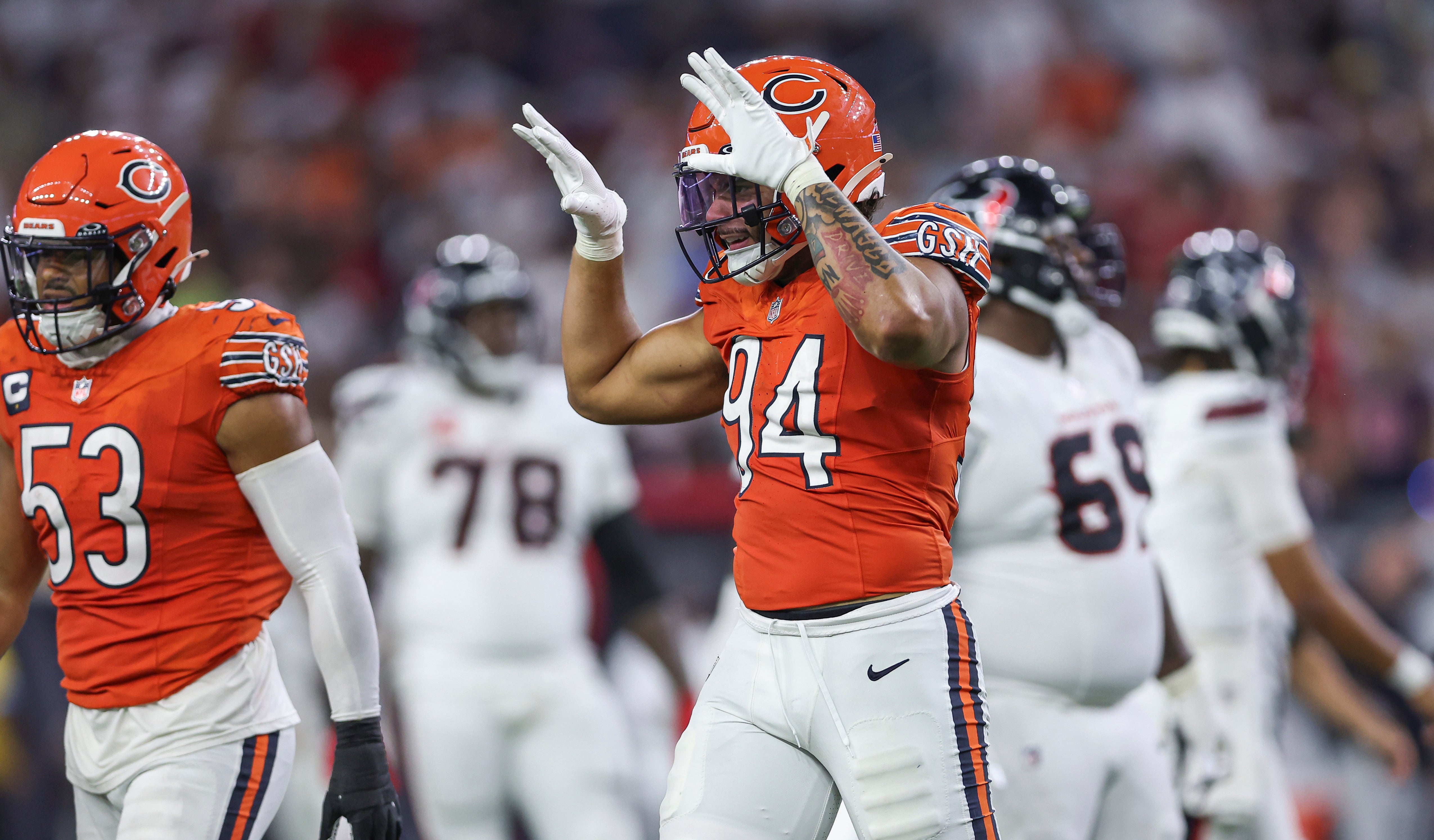 Sep 15, 2024; Houston, Texas, USA; Chicago Bears defensive end Austin Booker (94) reacts after a play during the game against the Houston Texans at NRG Stadium.