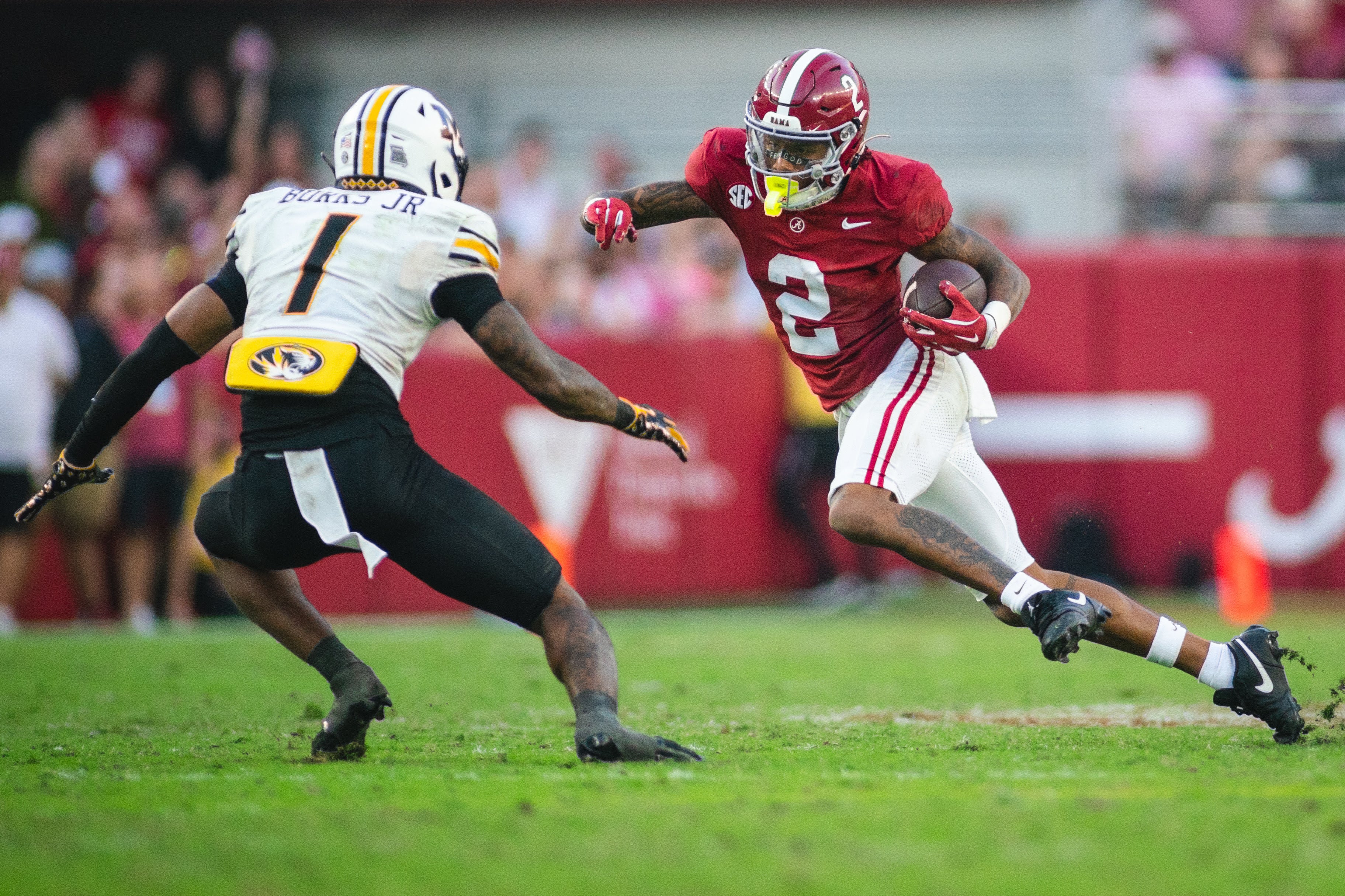 Oct 26, 2024; Tuscaloosa, Alabama, USA; Alabama Crimson Tide wide receiver Ryan Williams (2) runs the ball against Missouri Tigers safety Marvin Burks Jr. (1) during the fourth quarter at Bryant-Denny Stadium.