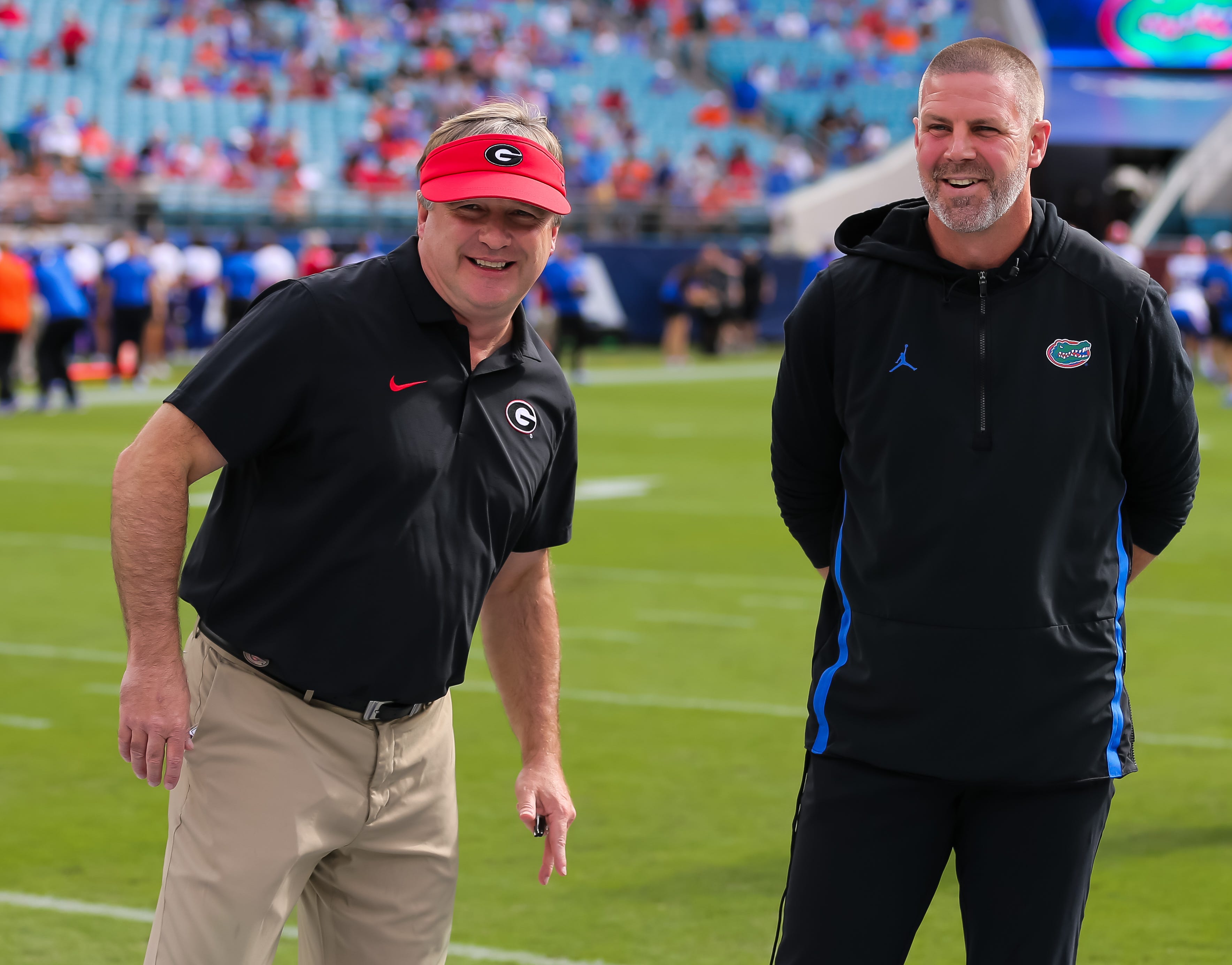 Georgia Bulldogs head coach Kirby Smart and Florida Gators head coach Billy Napier talk before the game before the first half at EverBank Stadium in Jacksonville, FL on Saturday, November 2, 2024. [Do... Doug Engle/Gainesville Sun-USA TODAY NETWORK via Imagn Images