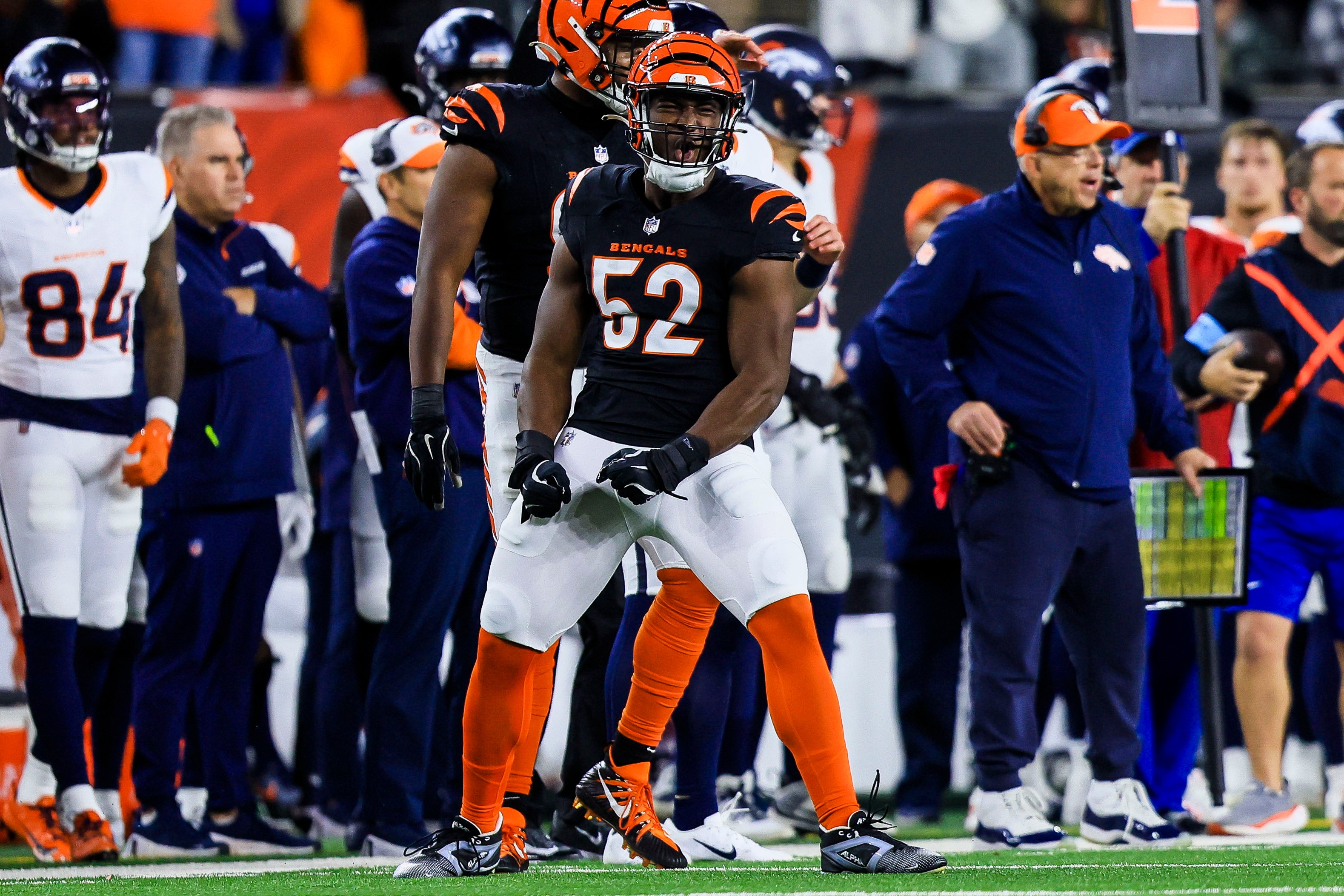 Dec 28, 2024; Cincinnati, Ohio, USA; Cincinnati Bengals defensive end Cedric Johnson (52) reacts after a play against the Denver Broncos in the first half at Paycor Stadium.
