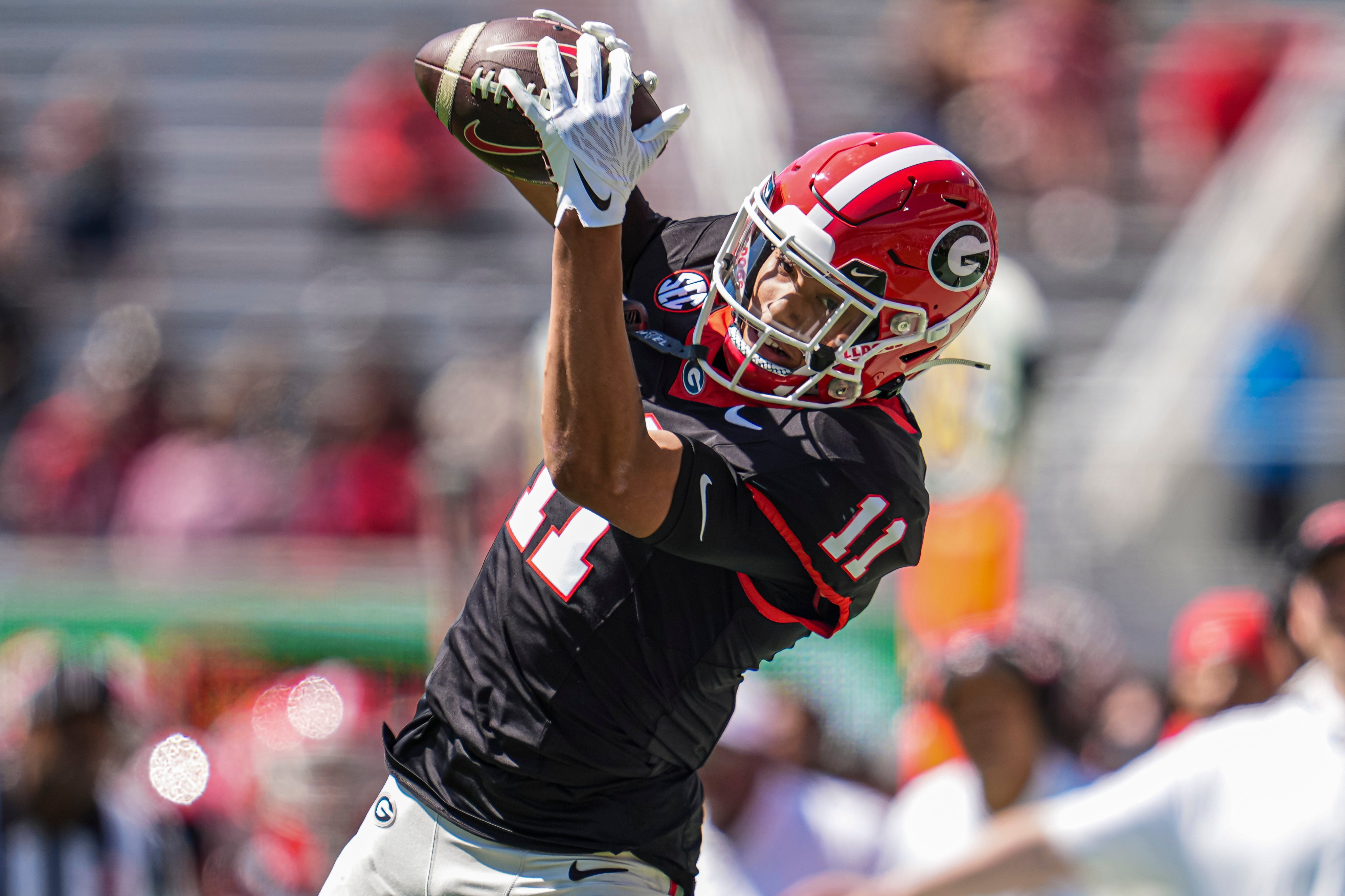 Georgia Bulldogs wide receiver Talyn Taylor (11) tries to make a catch during the Georgia Spring game at Sanford Stadium.