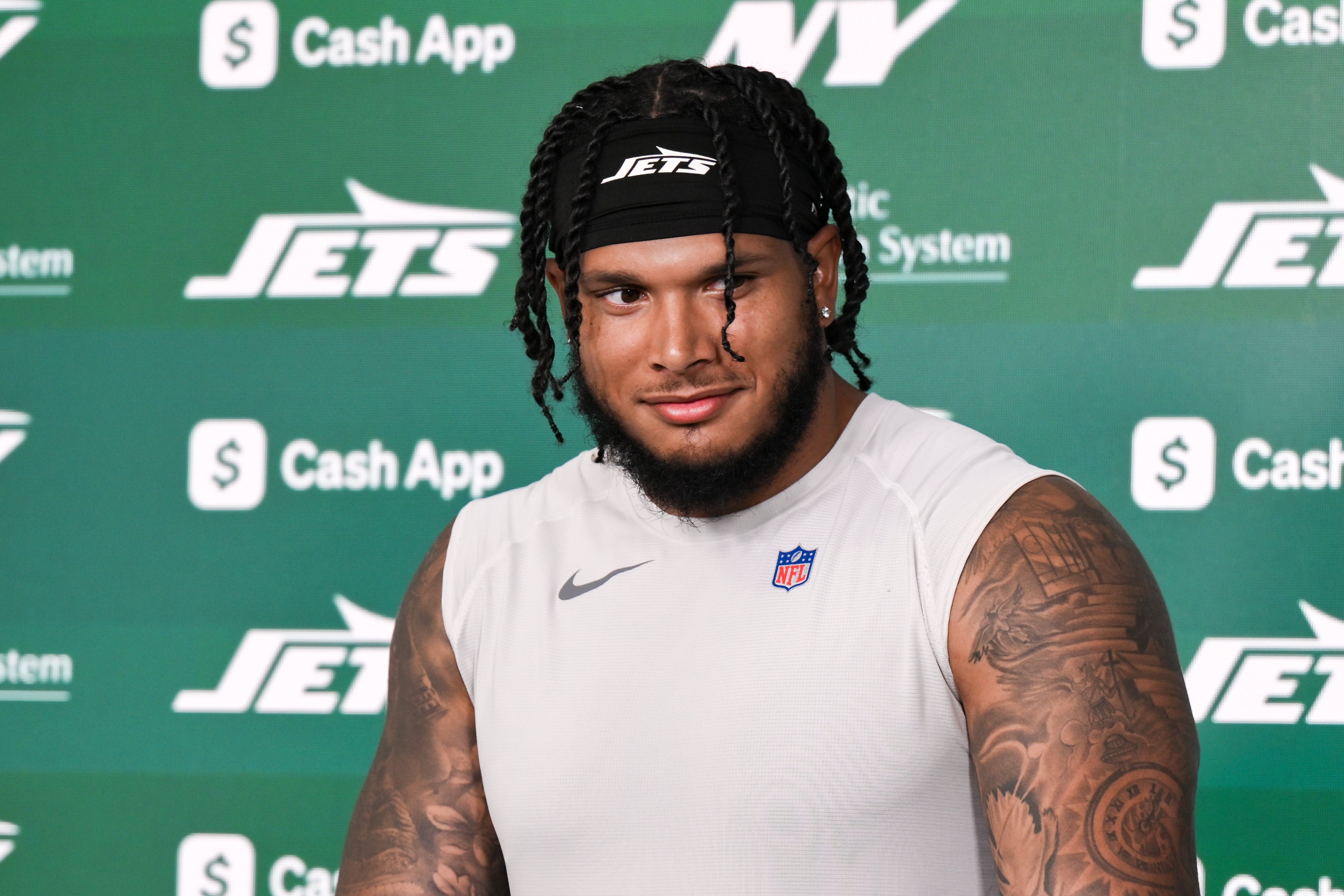 Jun 10, 2025; East Rutherford, NJ, USA; New York Jets linebacker Jermaine Johnson (11) speaks at a press conference during minicamp at Atlantic Health Jets Training Center.