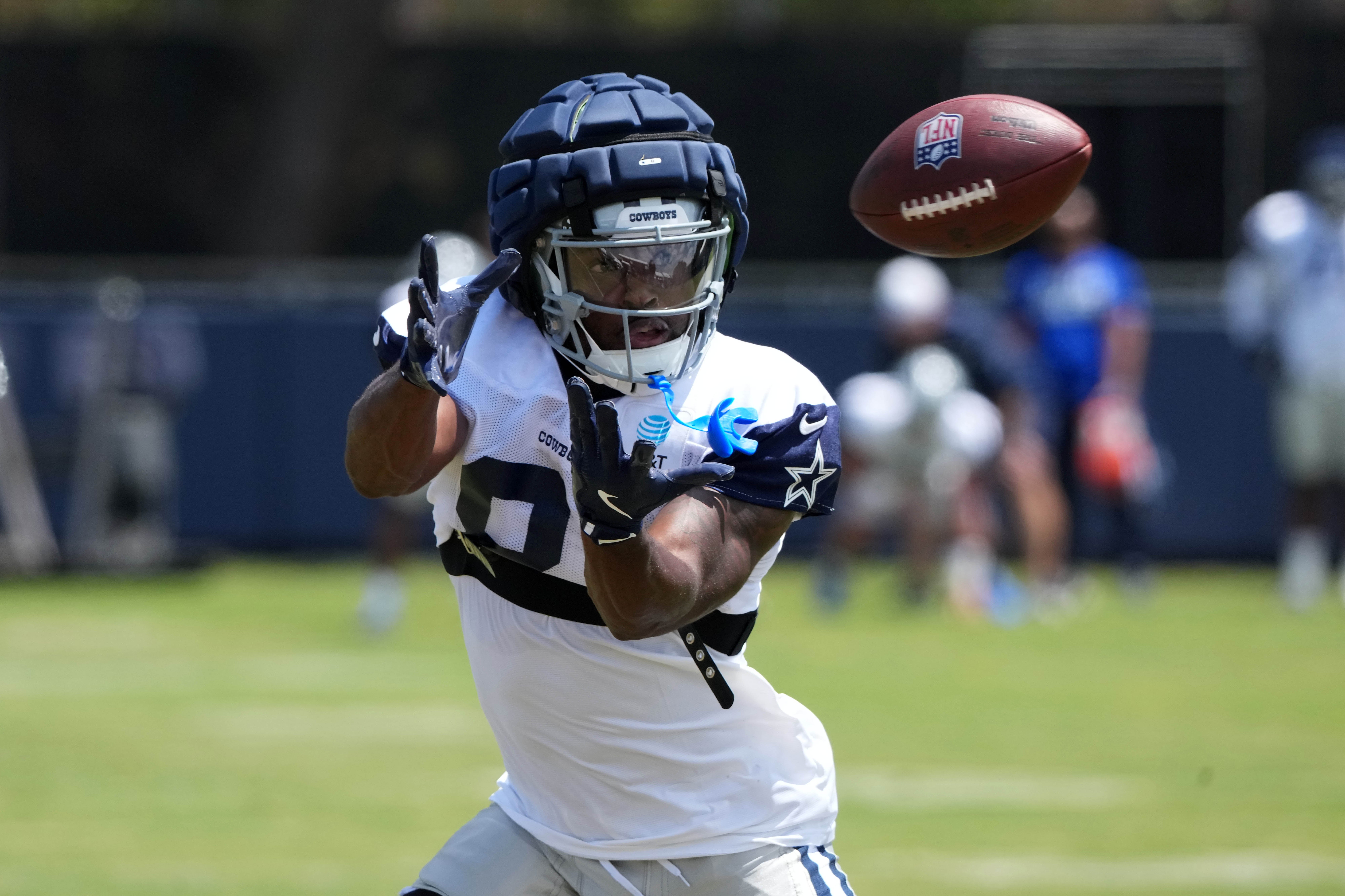 Jul 27, 2025; Oxnard, CA, USA; Dallas Cowboys wide receiver Jonathan Mingo (81) catches the ball at training camp at the River Ridge Fields.