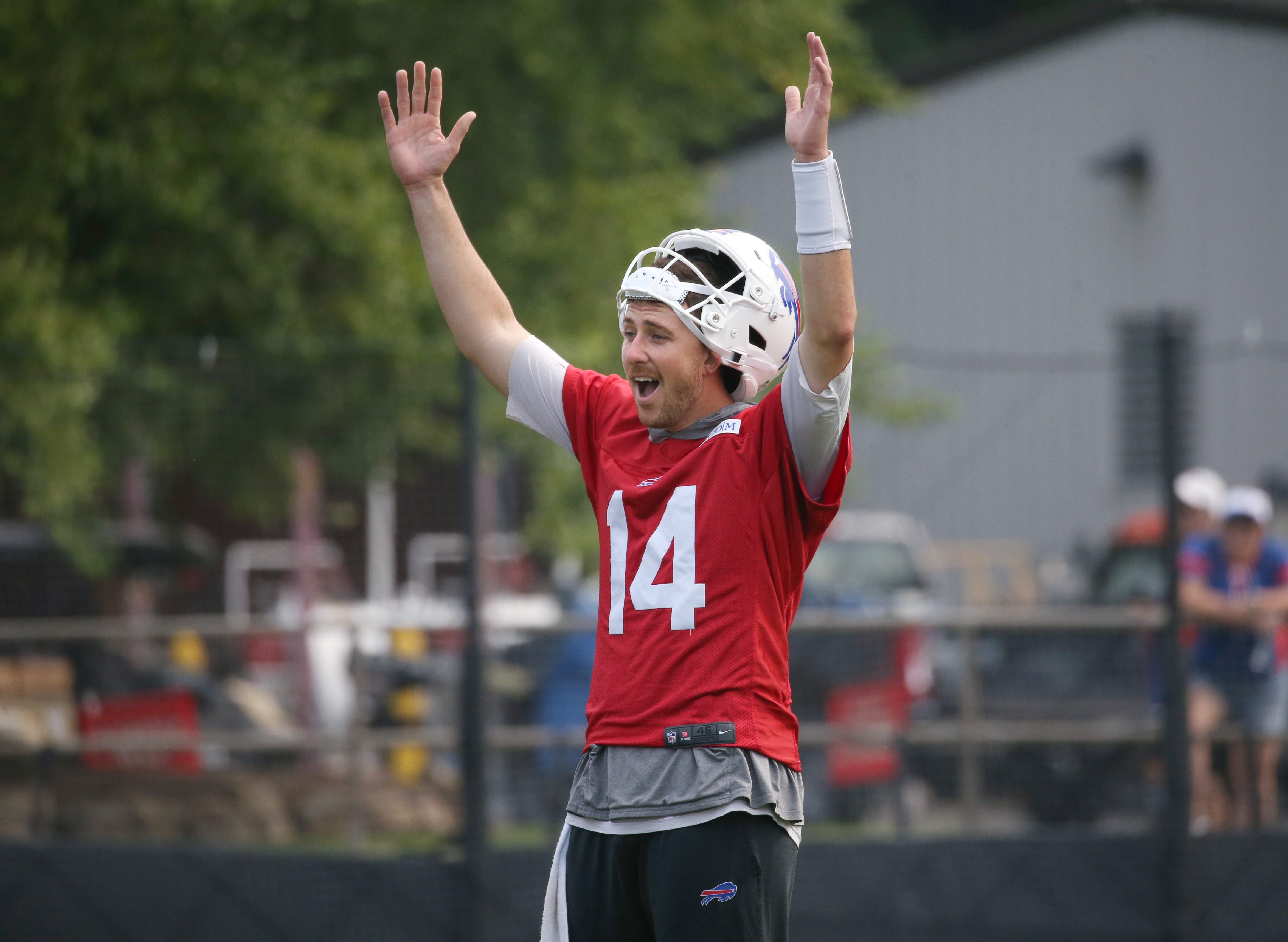 Bills quarterback Mike White celebrates as Shane Buechele throws a perfect three-for-three during position drills during the final day of Buffalo Bills training camp at St. John Fisher University Thursday, August 7, 2025 in Pittsford, NY.