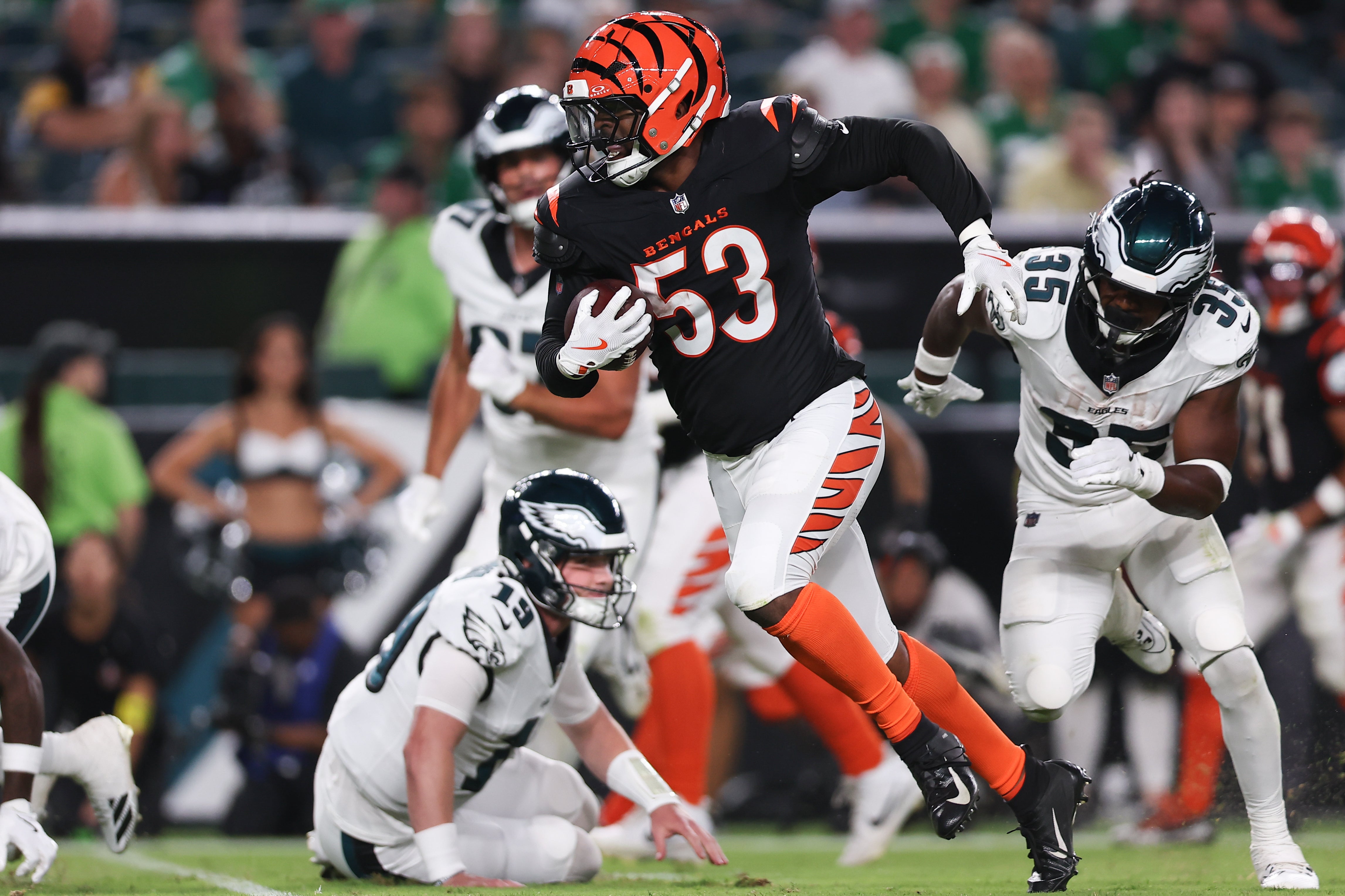 Aug 7, 2025; Philadelphia, Pennsylvania, USA; Cincinnati Bengals linebacker Joe Giles-Harris (53) intercepts the ball against the Philadelphia Eagles during the fourth quarter at Lincoln Financial Field.