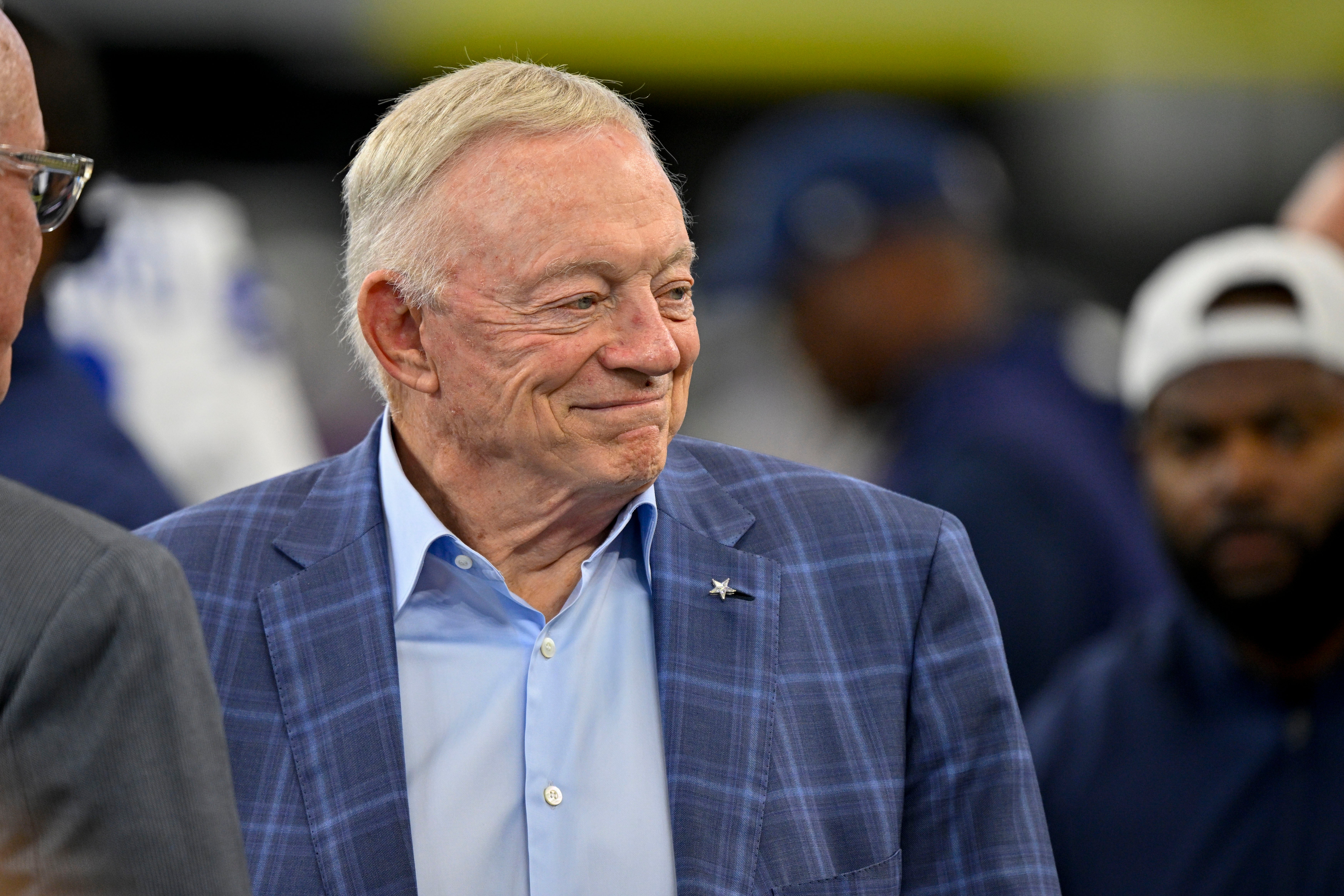 Aug 16, 2025; Arlington, Texas, USA; Dallas Cowboys owner Jerry Jones (left) looks on before the game against the Baltimore Ravens at AT&T Stadium.