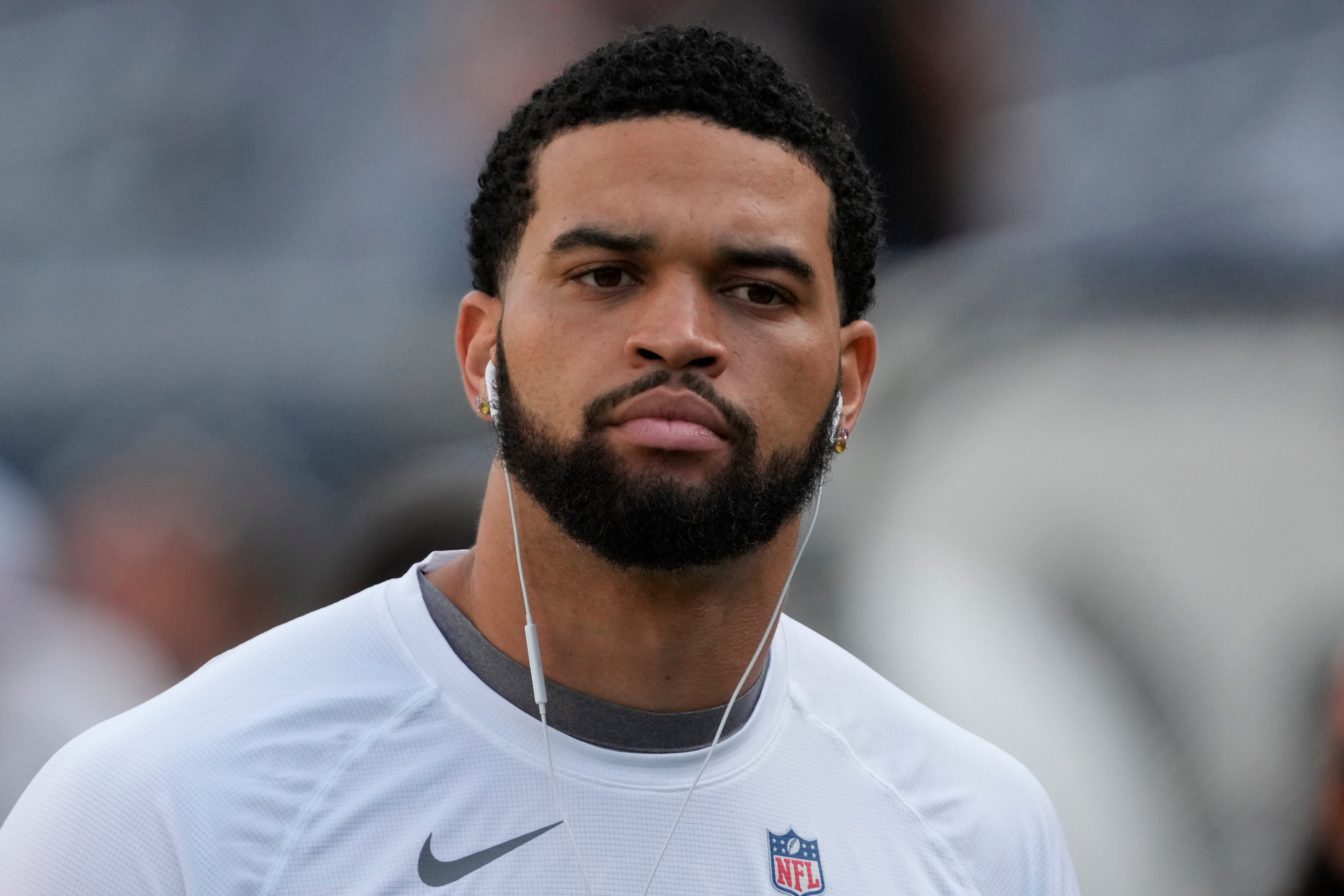 Aug 17, 2025; Chicago, Illinois, USA; Chicago Bears quarterback Caleb Williams (18) warms up before a game against the Buffalo Bills at Soldier Field.