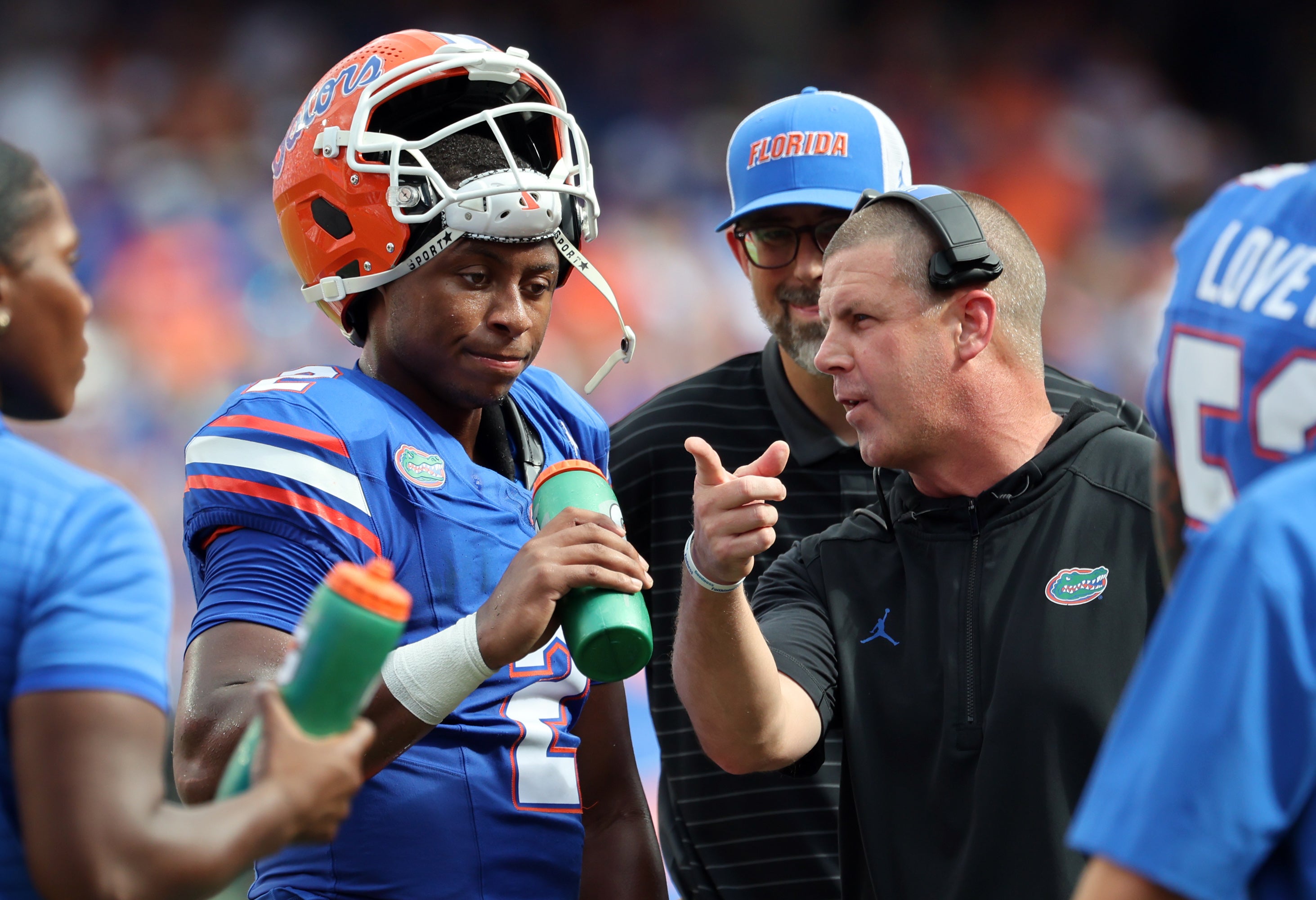 Sep 6, 2025; Gainesville, Florida, USA; Florida Gators head coach Billy Napier talks with Florida Gators quarterback DJ Lagway (2) against the South Florida Bulls during the first quarter at Ben Hill Griffin Stadium.