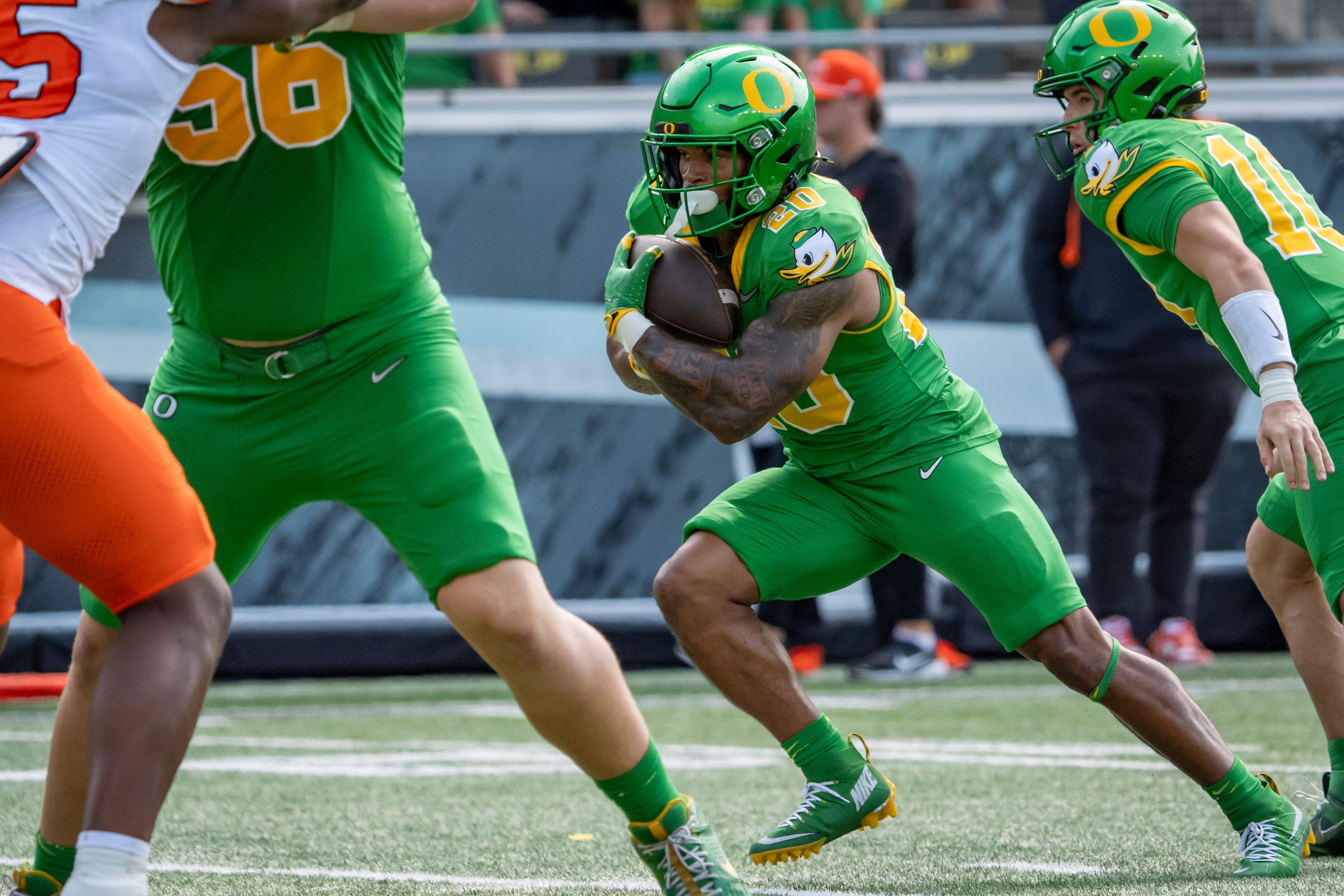 Oregon running back Makhi Hughes carries the ball as the Oregon Ducks host the Oklahoma State Cowboys on Sept. 6, 2025, at Autzen Stadium in Eugene, Oregon.
