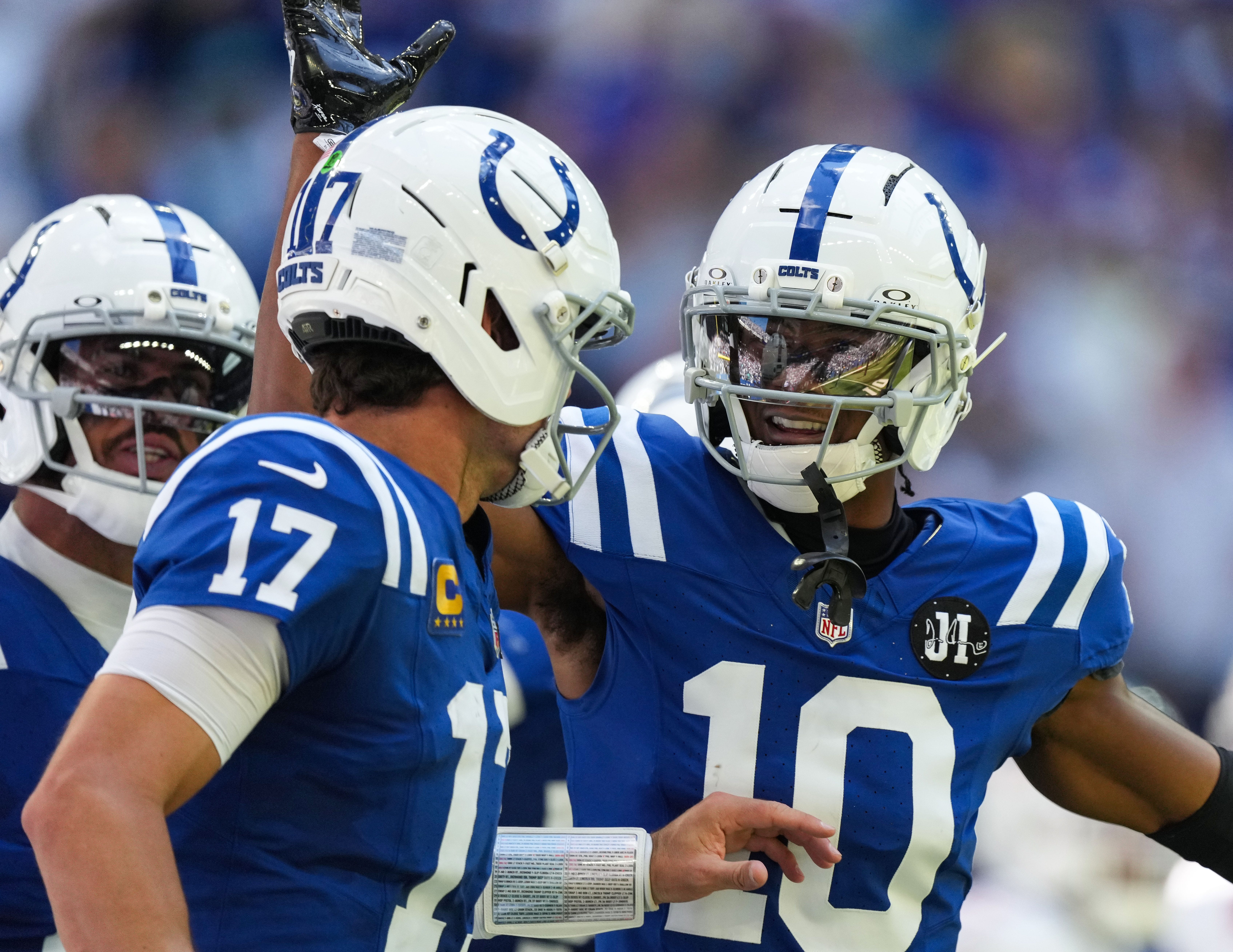 Colts QB Daniel Jones and WR Adonai Mitchell celebrate a play