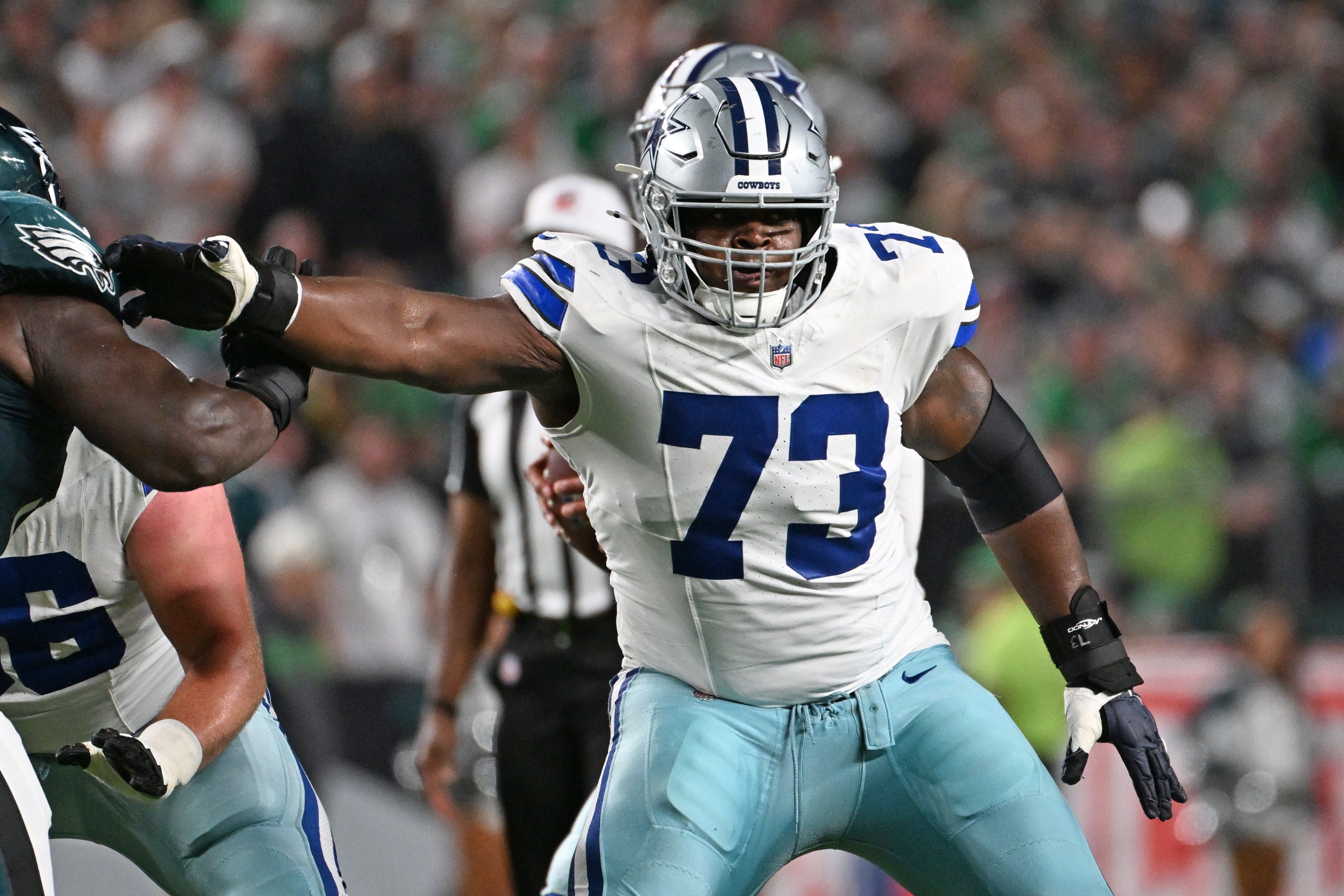 Sep 4, 2025; Philadelphia, Pennsylvania, USA; Dallas Cowboys guard Tyler Smith (73) blocks against the Philadelphia Eagles at Lincoln Financial Field.