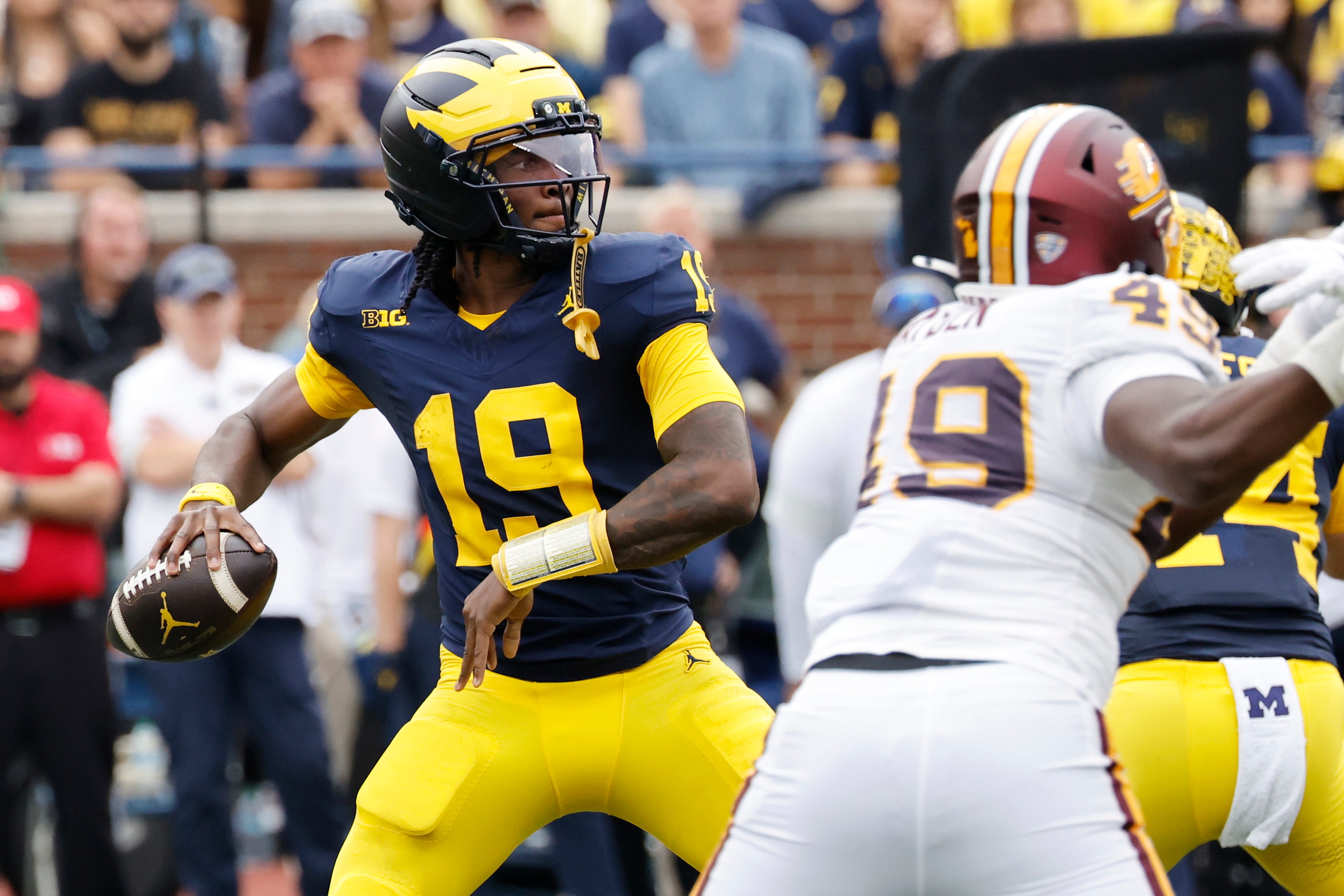 Sep 13, 2025; Ann Arbor, Michigan, USA; Michigan Wolverines quarterback Bryce Underwood (19) passes in the first half against the Central Michigan Chippewas at Michigan Stadium.