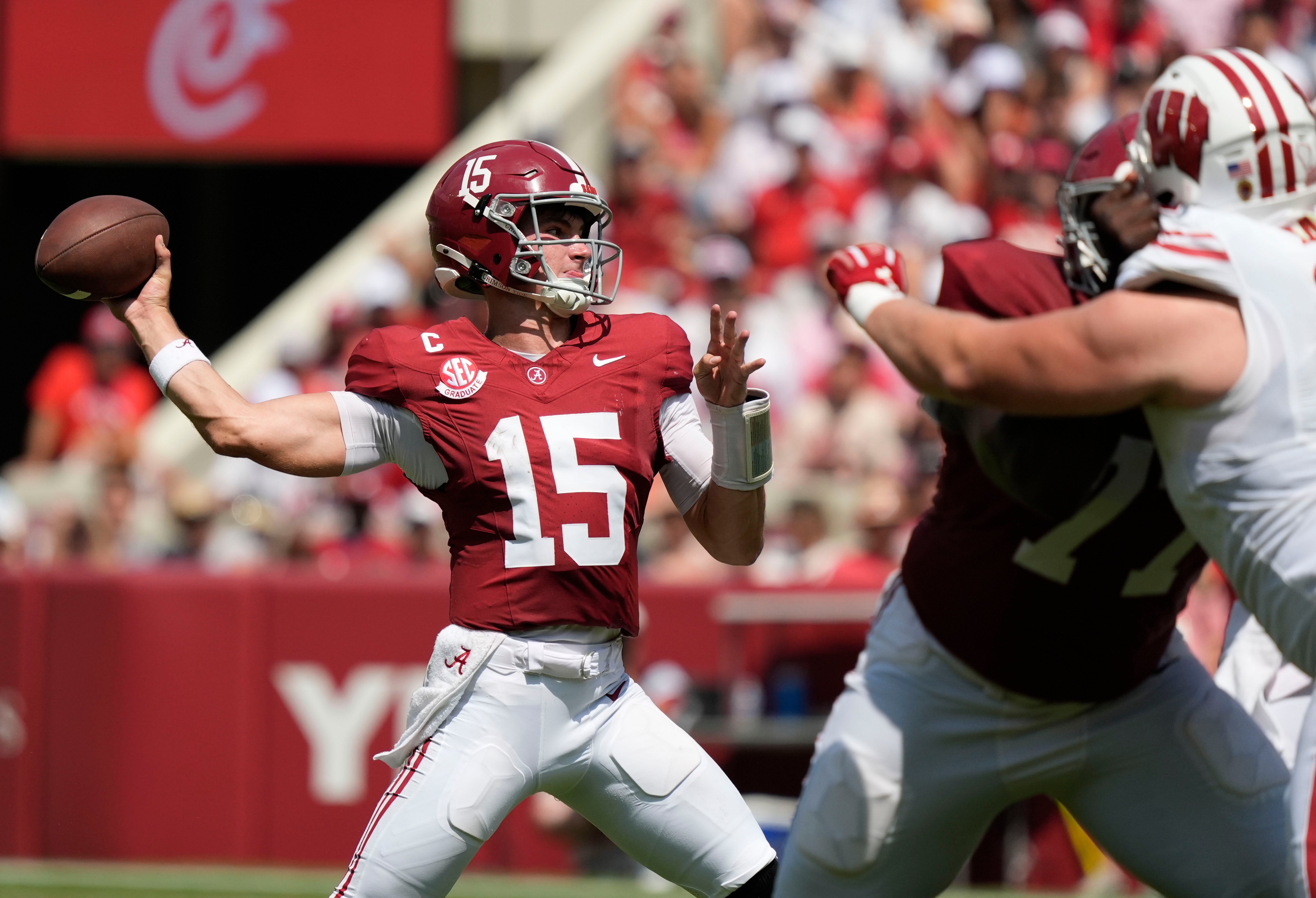 Sep 13, 2025; Tuscaloosa, Alabama, USA; Alabama quarterback Ty Simpson (15) passes against Wisconsin at Saban Field at Bryant-Denny Stadium.