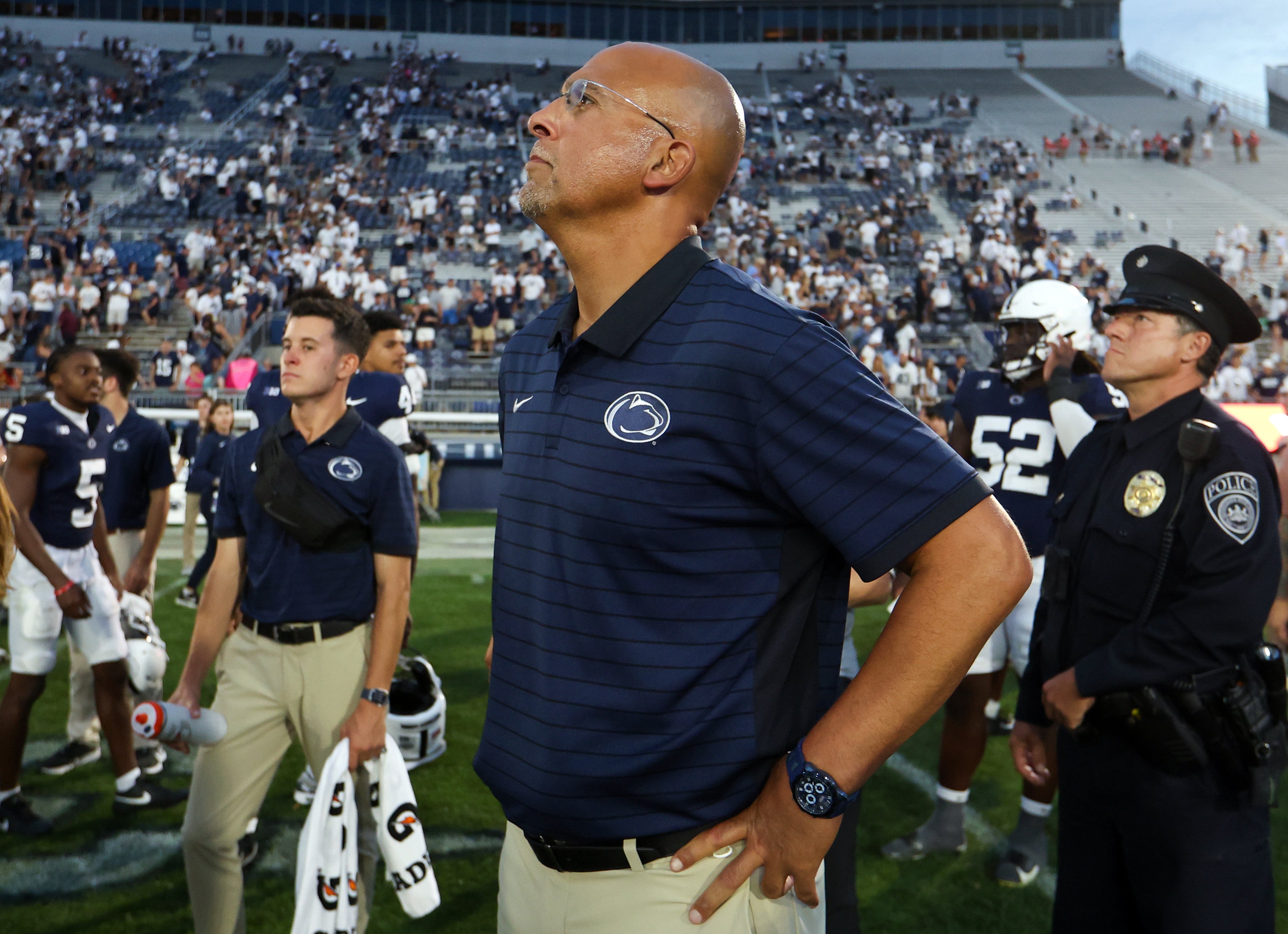 Sep 13, 2025; University Park, Pennsylvania, USA; Penn State Nittany Lions head coach James Franklin watches the replay of the final play of the game following the end of the game against the Villanova Wildcats at Beaver Stadium. Mandatory Credit: Matthew O'Haren-Imagn Images