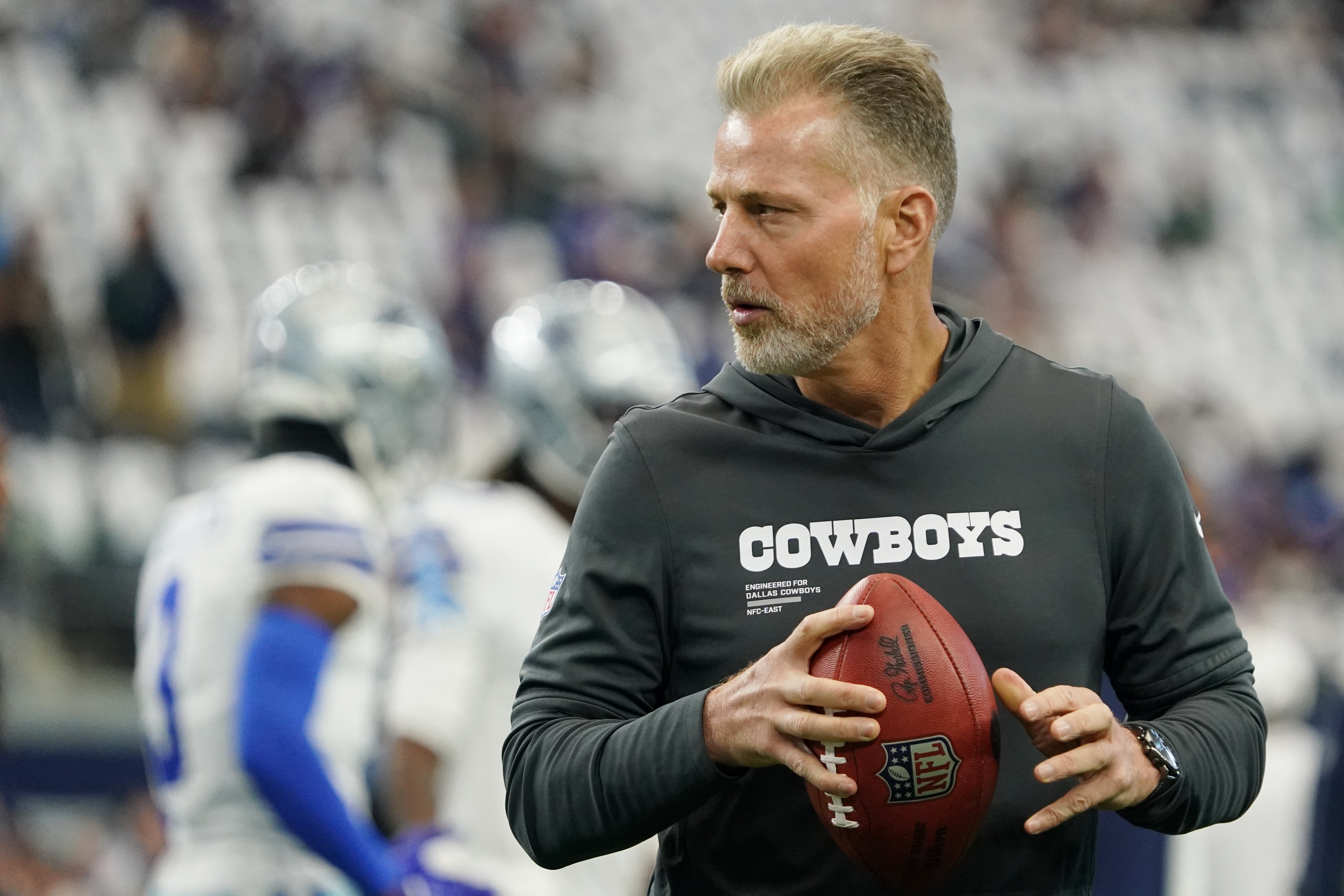 Sep 14, 2025; Arlington, Texas, USA; Dallas Cowboys defensive coordinator Matt Eberflus looks on during warmups before the game against the New York Giants at AT&T Stadium.