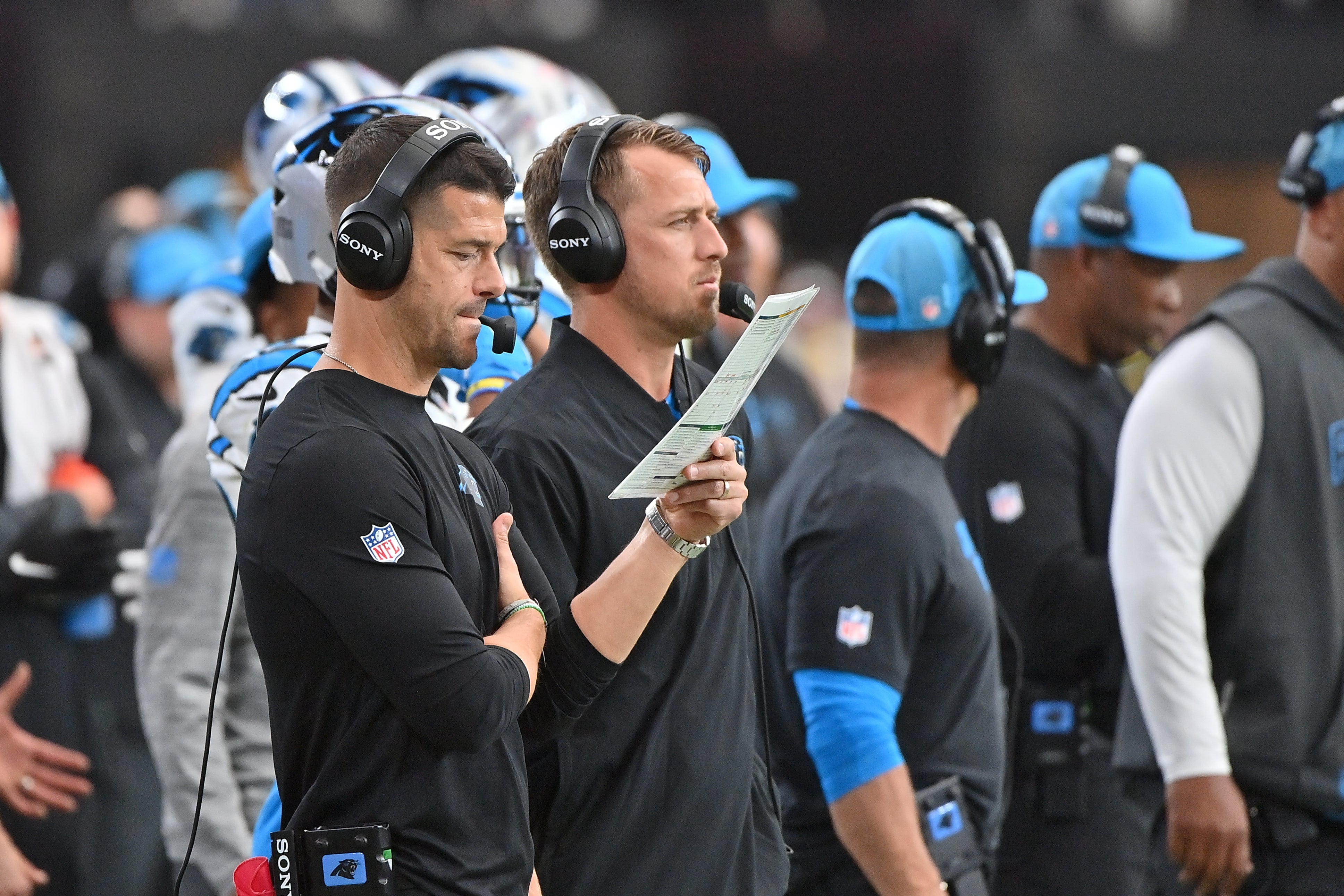 Panthers coaching staff on the sideline