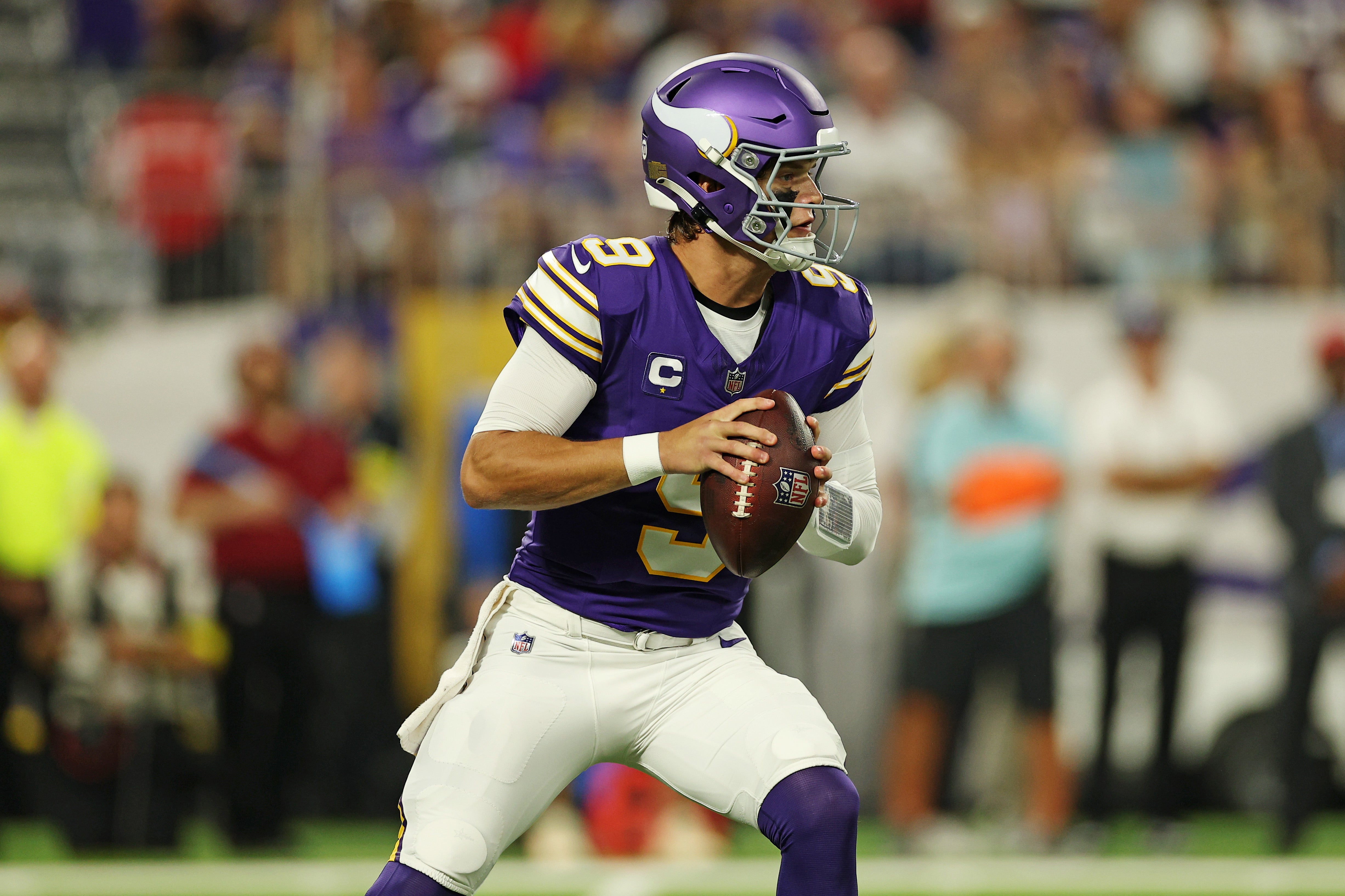 Sep 14, 2025; Minneapolis, Minnesota, USA; Minnesota Vikings quarterback J.J. McCarthy (9) looks to make a pass during the first half against the Atlanta Falcons at U.S. Bank Stadium.