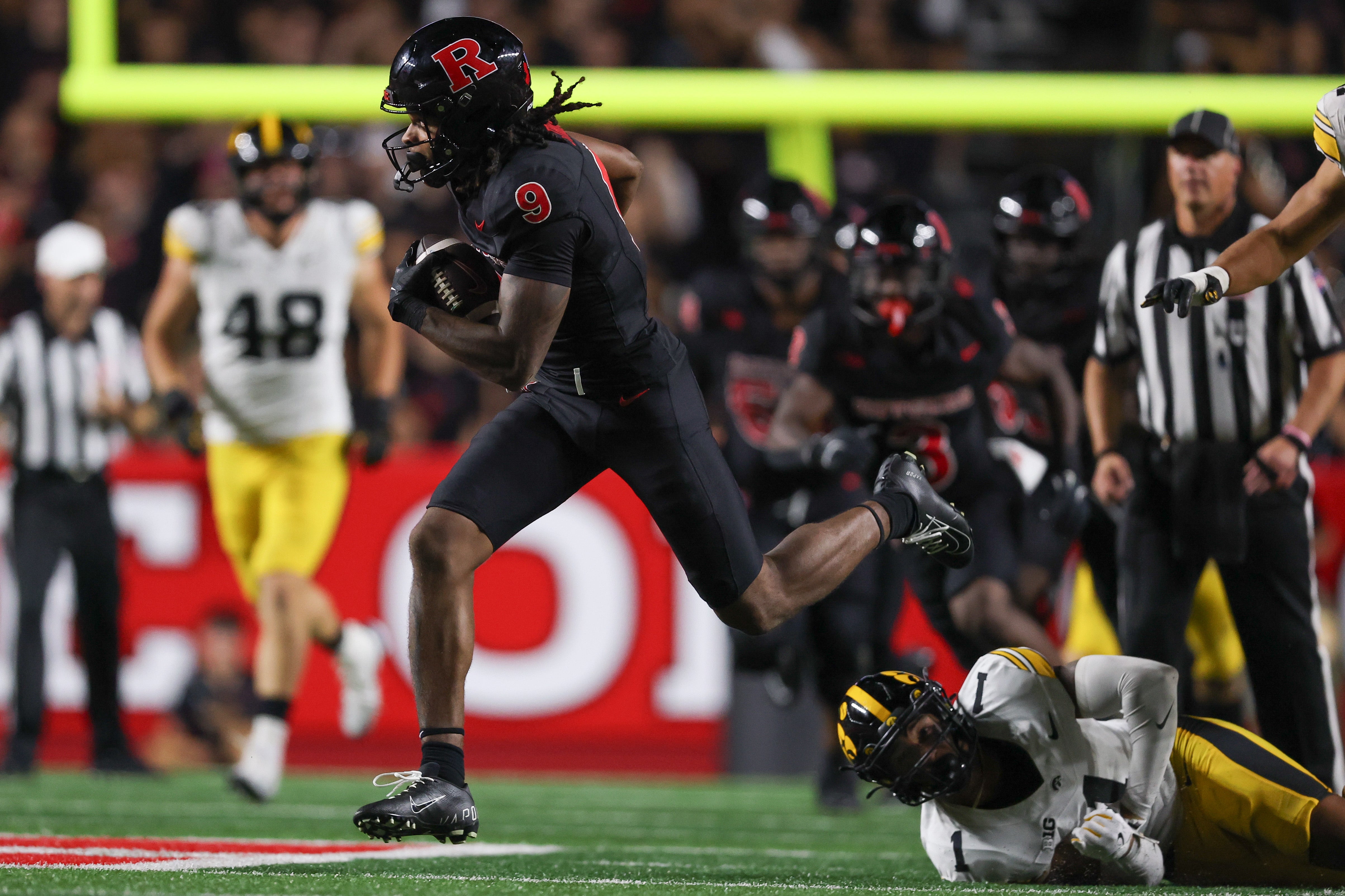 Sep 19, 2025; Piscataway, New Jersey, USA; Rutgers Scarlet Knights wide receiver Ian Strong (9) gains yards after catch during the second half against the Iowa Hawkeyes at SHI Stadium. Mandatory Credit: Vincent Carchietta-Imagn Images